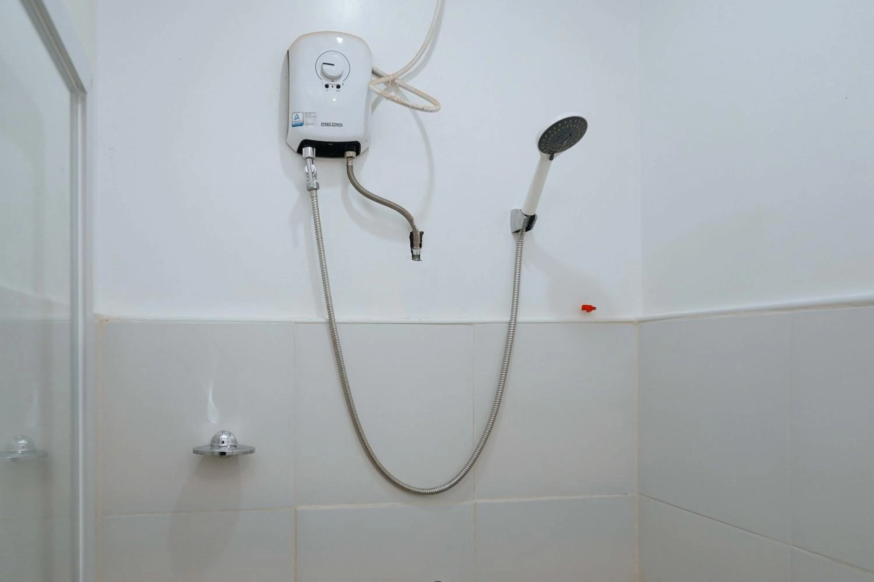 Shower in RedDoorz Plus at Billy's Resort Oslob