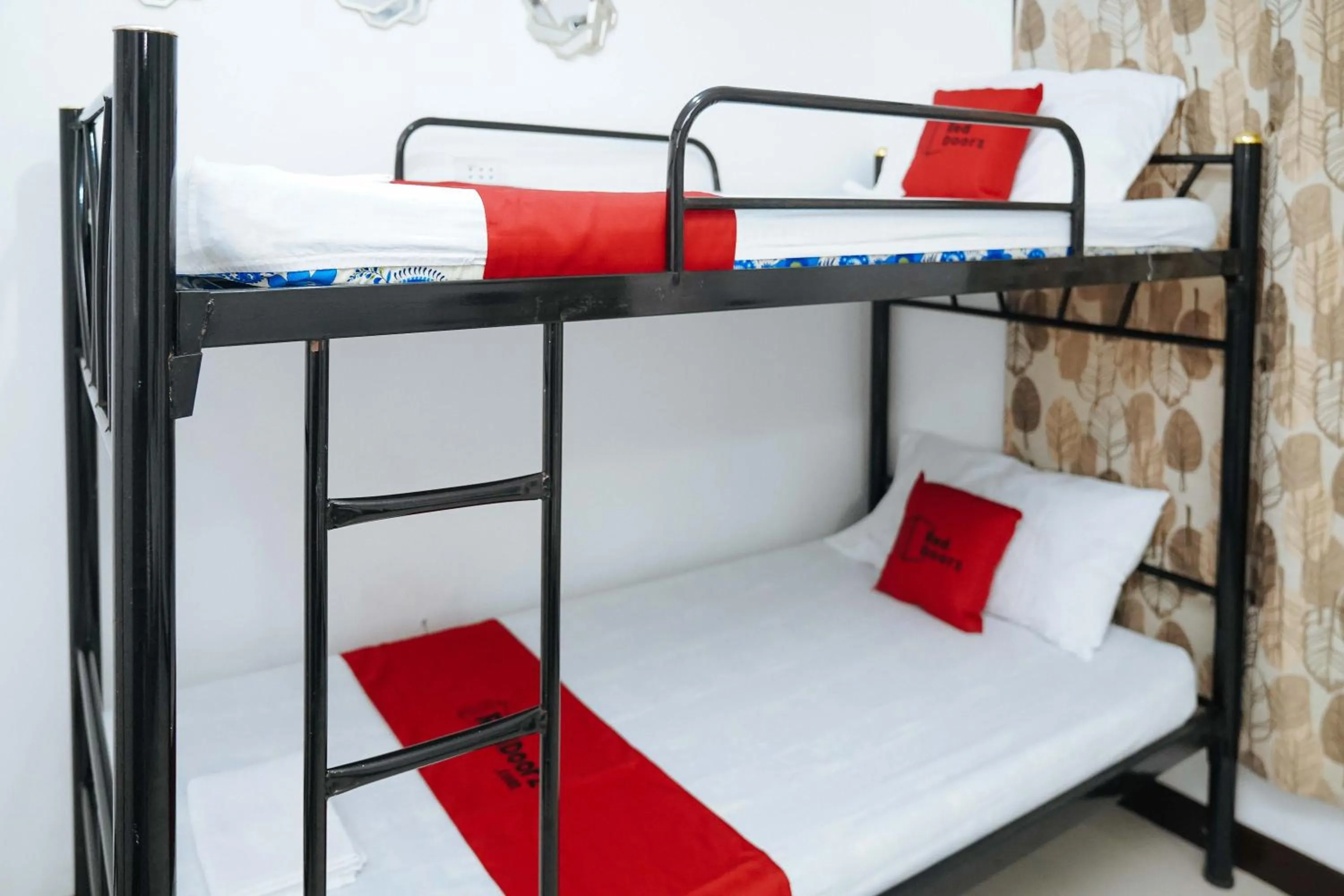 bunk bed, Bed in RedDoorz Plus at Billy's Resort Oslob