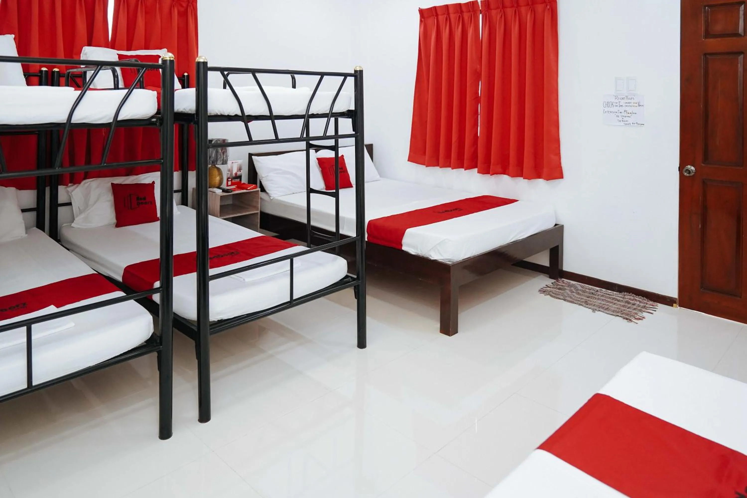 bunk bed, Bed in RedDoorz Plus at Billy's Resort Oslob