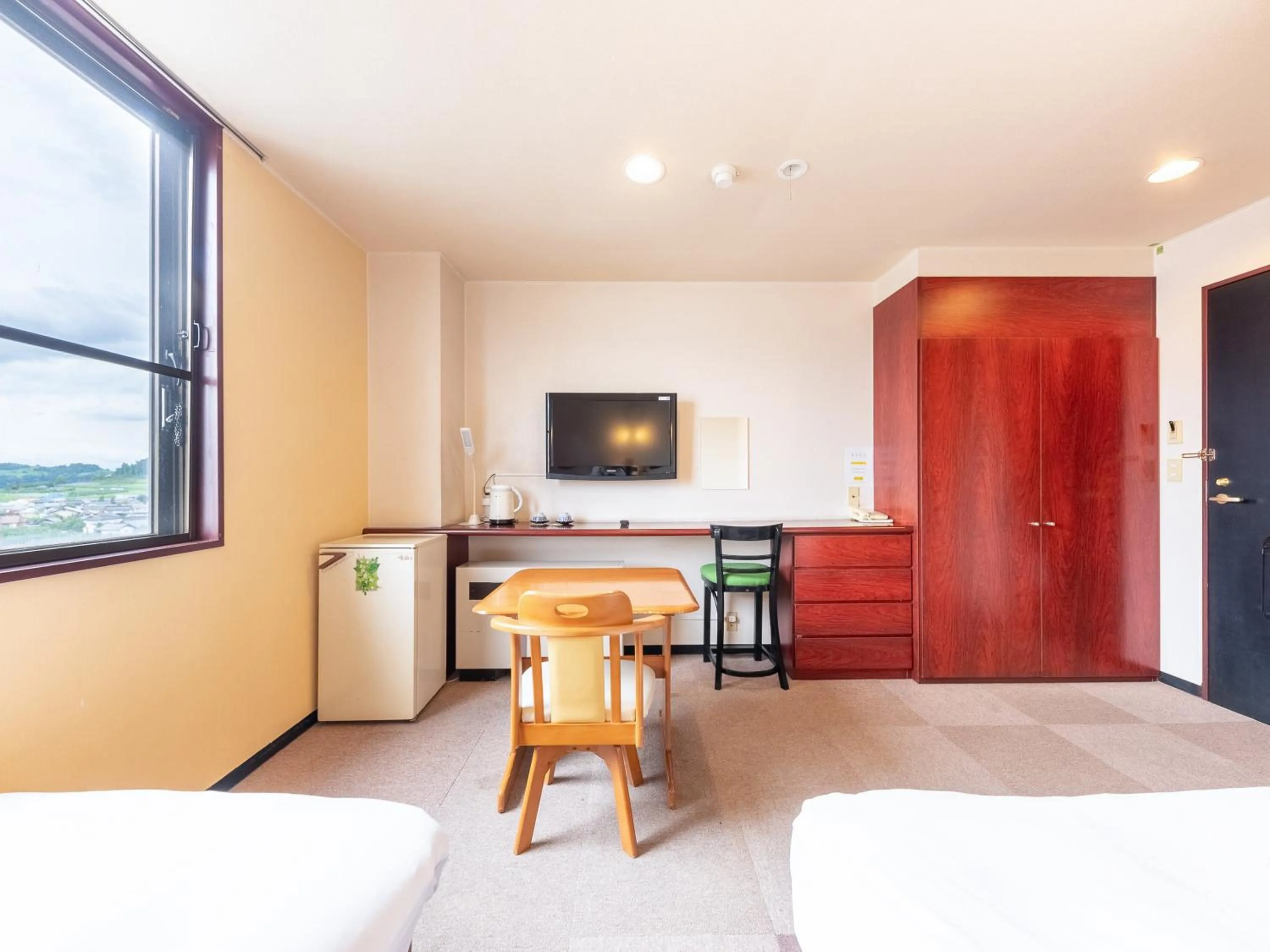 Bed in Tabist Travel Inn Shinshu Nakano