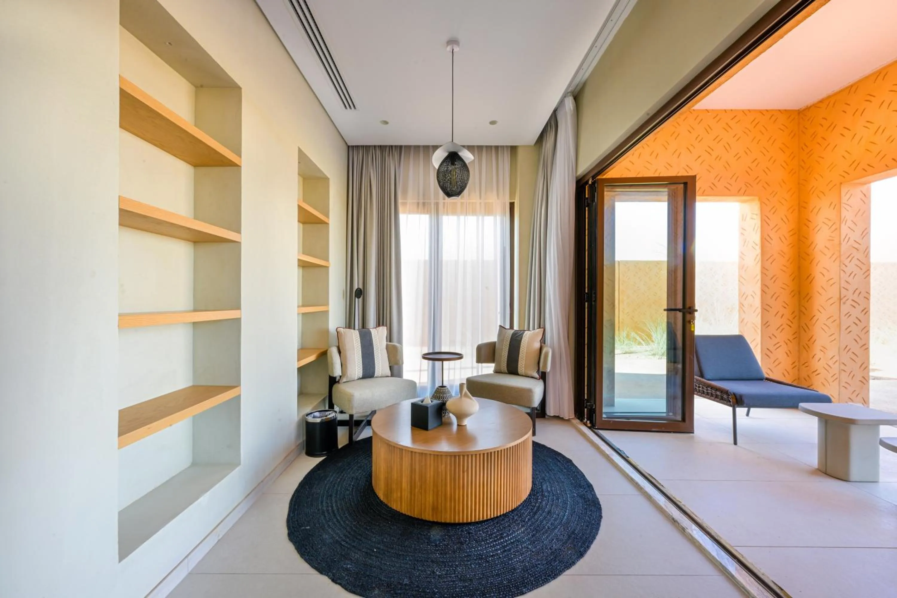 Seating area in Al Badayer Retreat by Sharjah Collection