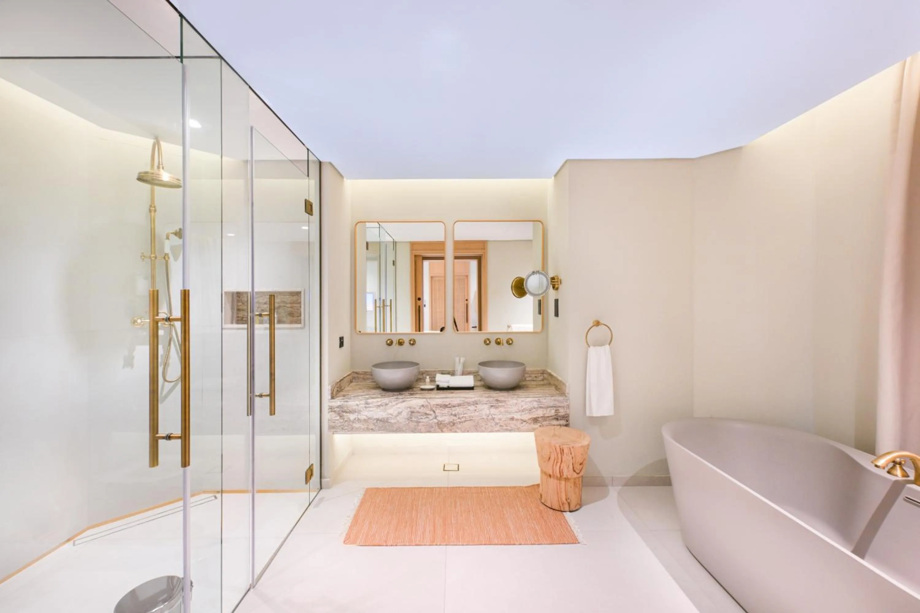 Shower, Bed in Al Badayer Retreat by Sharjah Collection