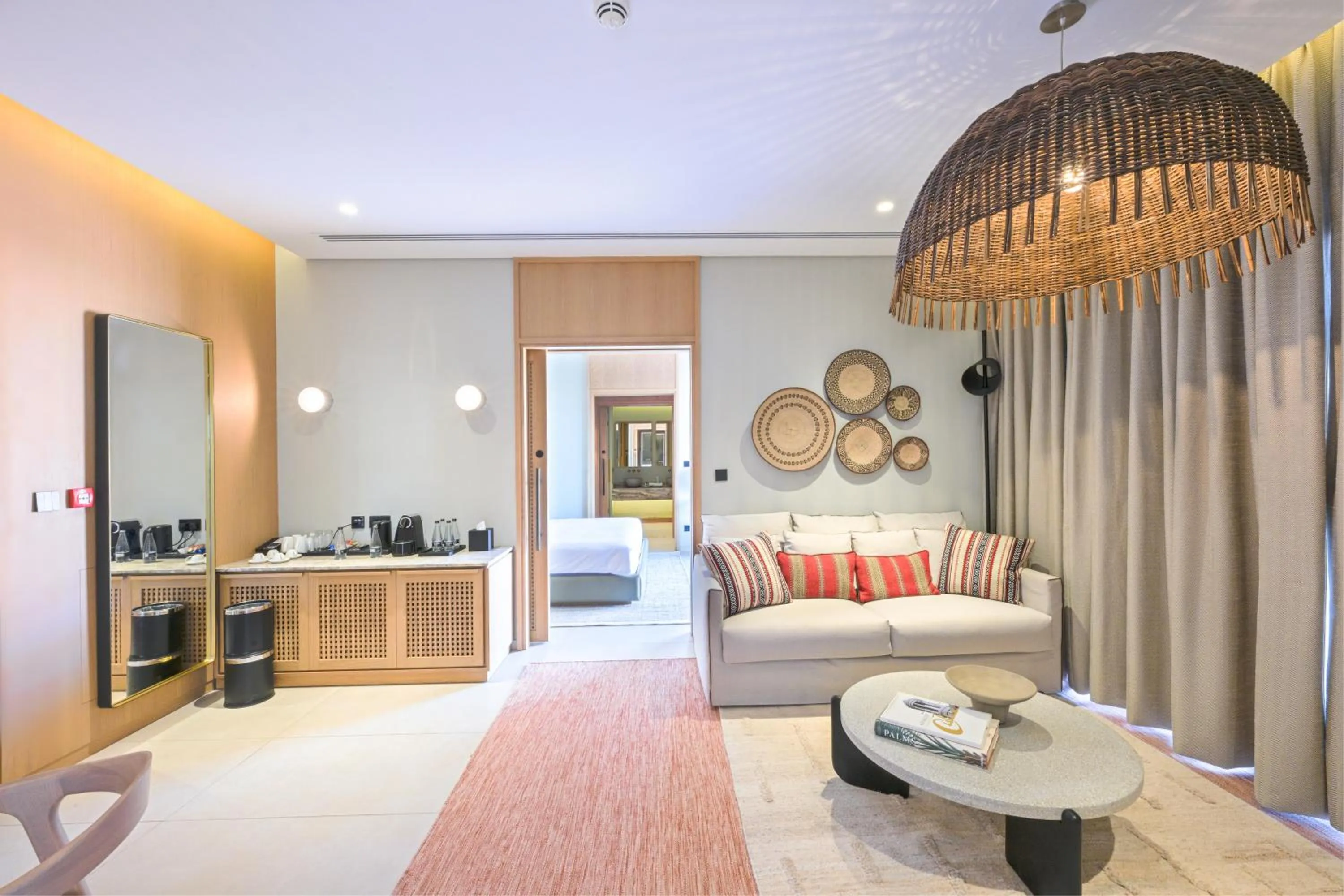 Living room, Bed in Al Badayer Retreat by Sharjah Collection