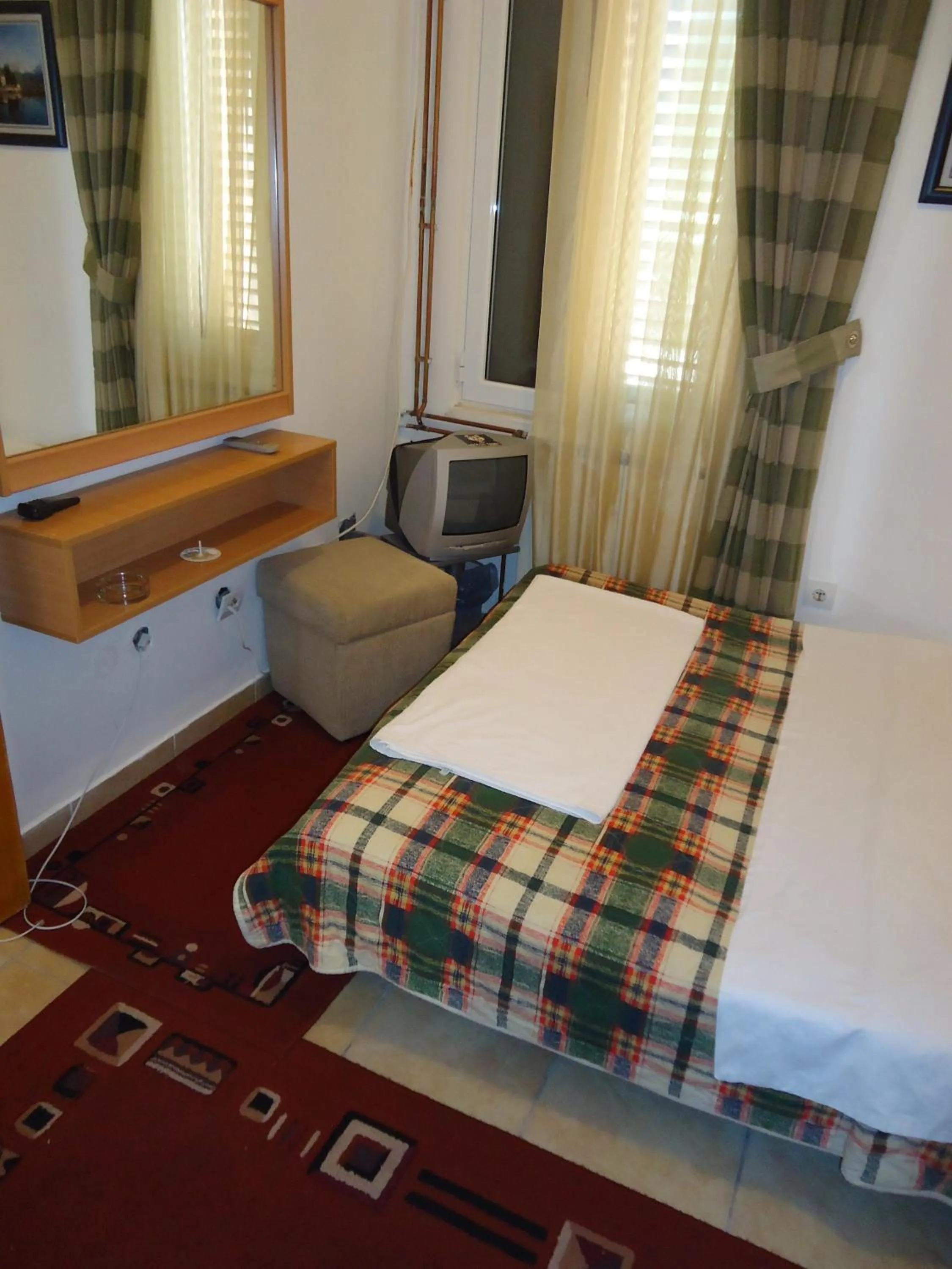 Bed in Hotel Pelikan