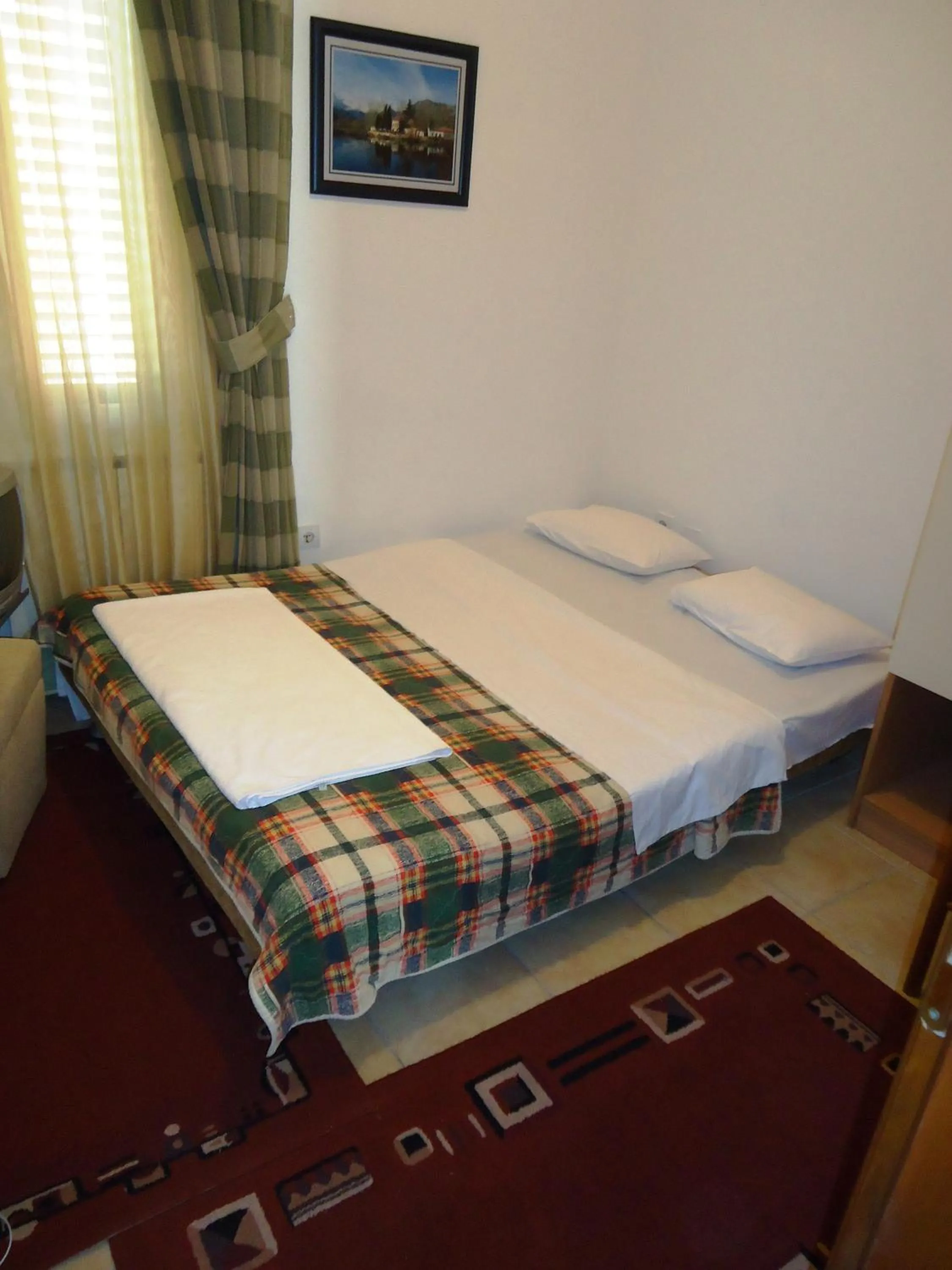 Bed in Hotel Pelikan