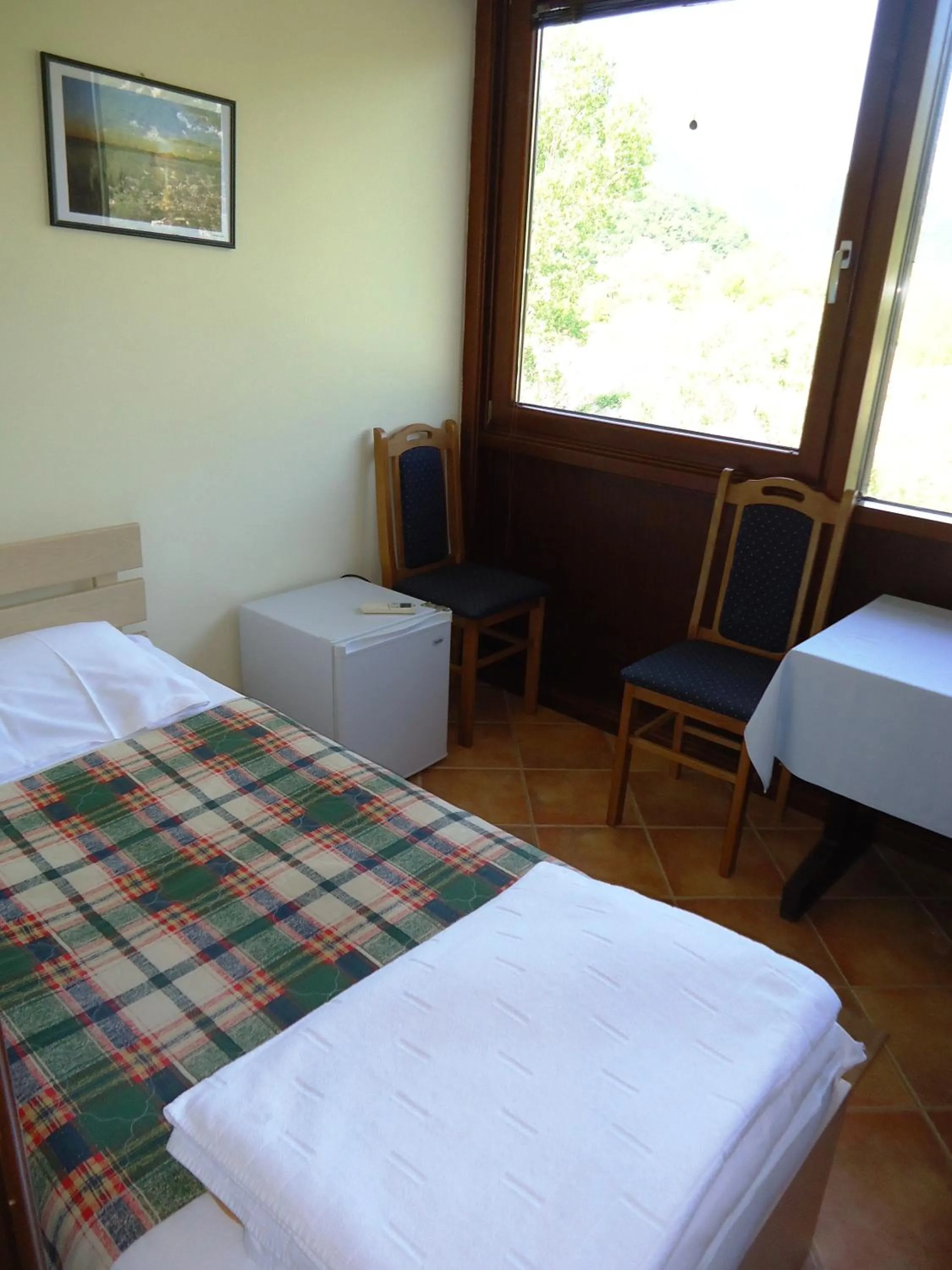 Bed in Hotel Pelikan