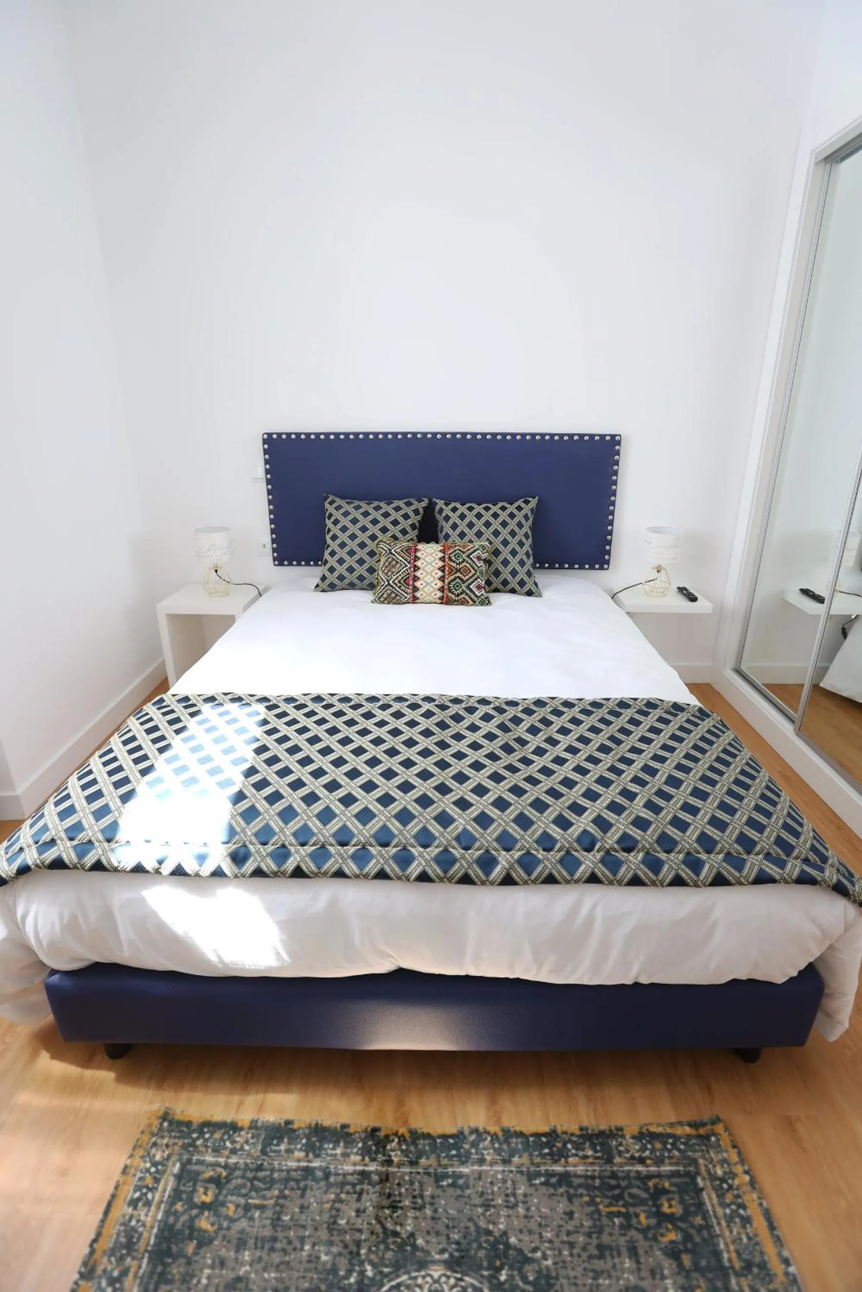 Bed in Glass Boutique - Rooms & Suites