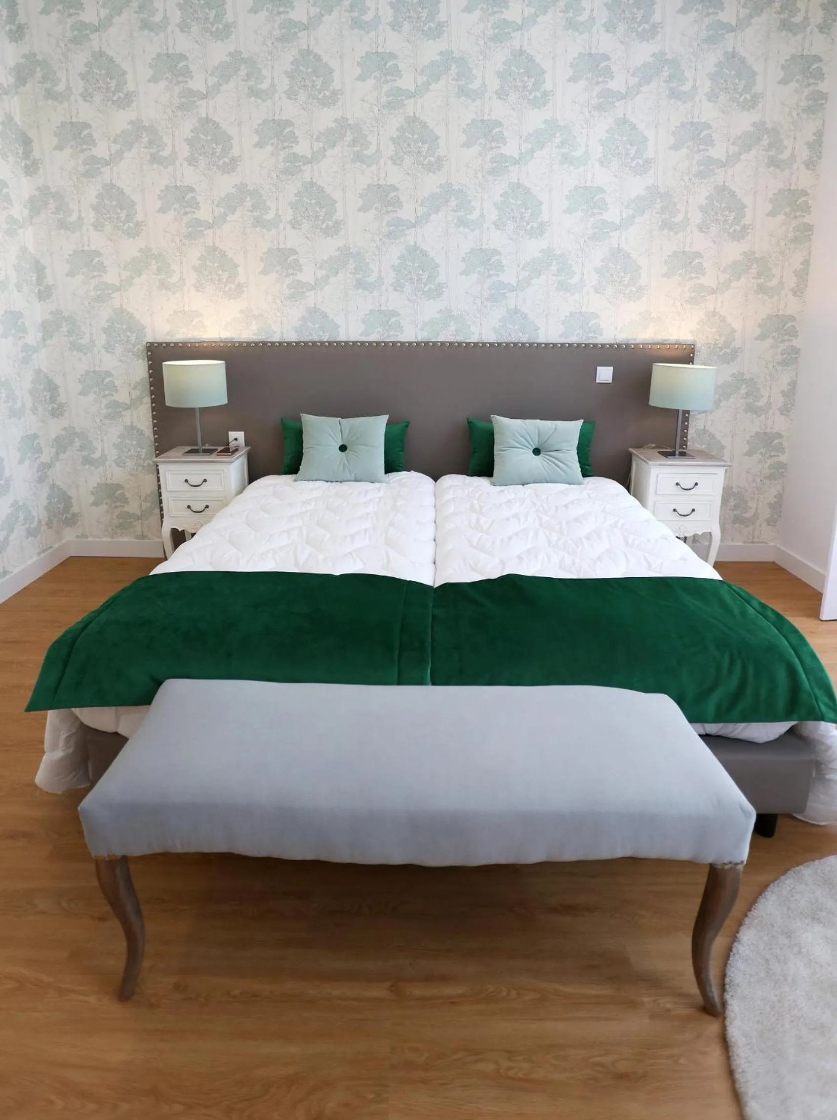 Bed in Glass Boutique - Rooms & Suites