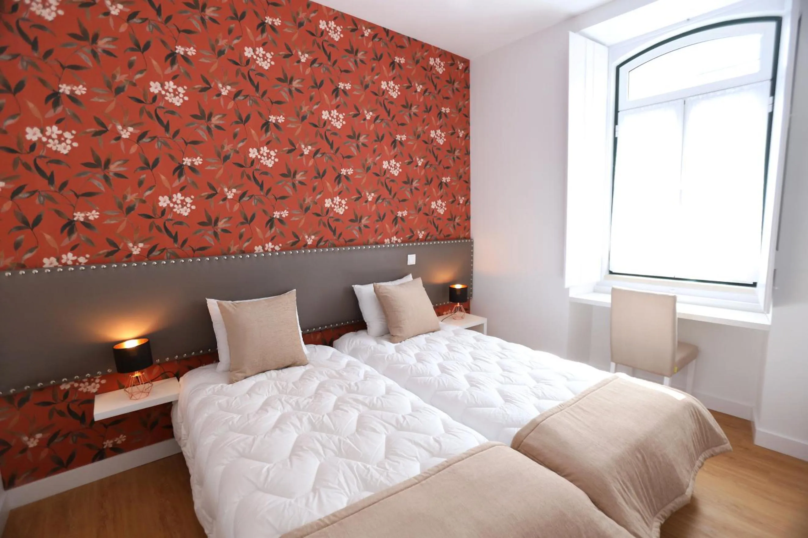 Bed in Glass Boutique - Rooms & Suites