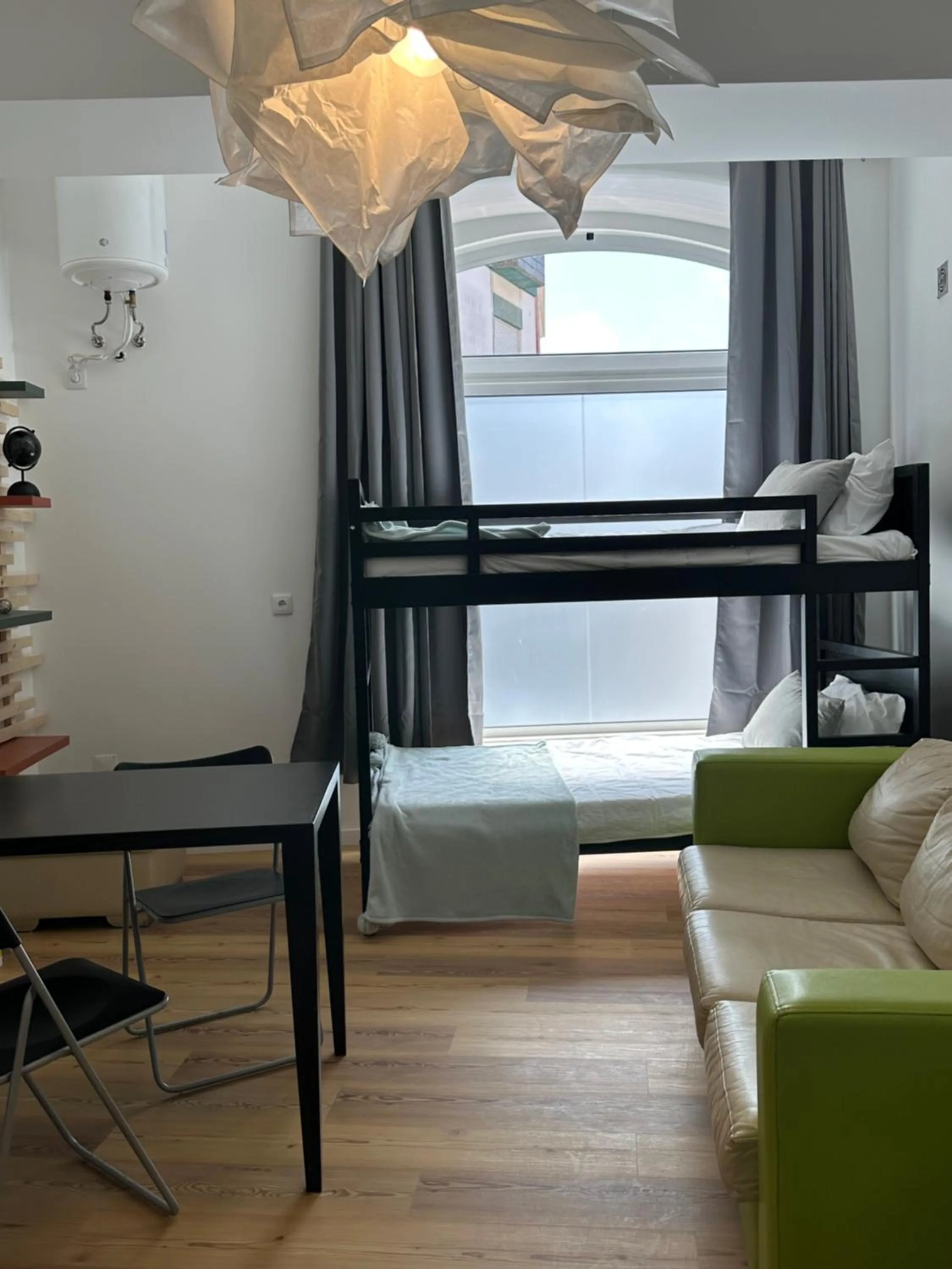 Bed in Glass Boutique - Rooms & Suites