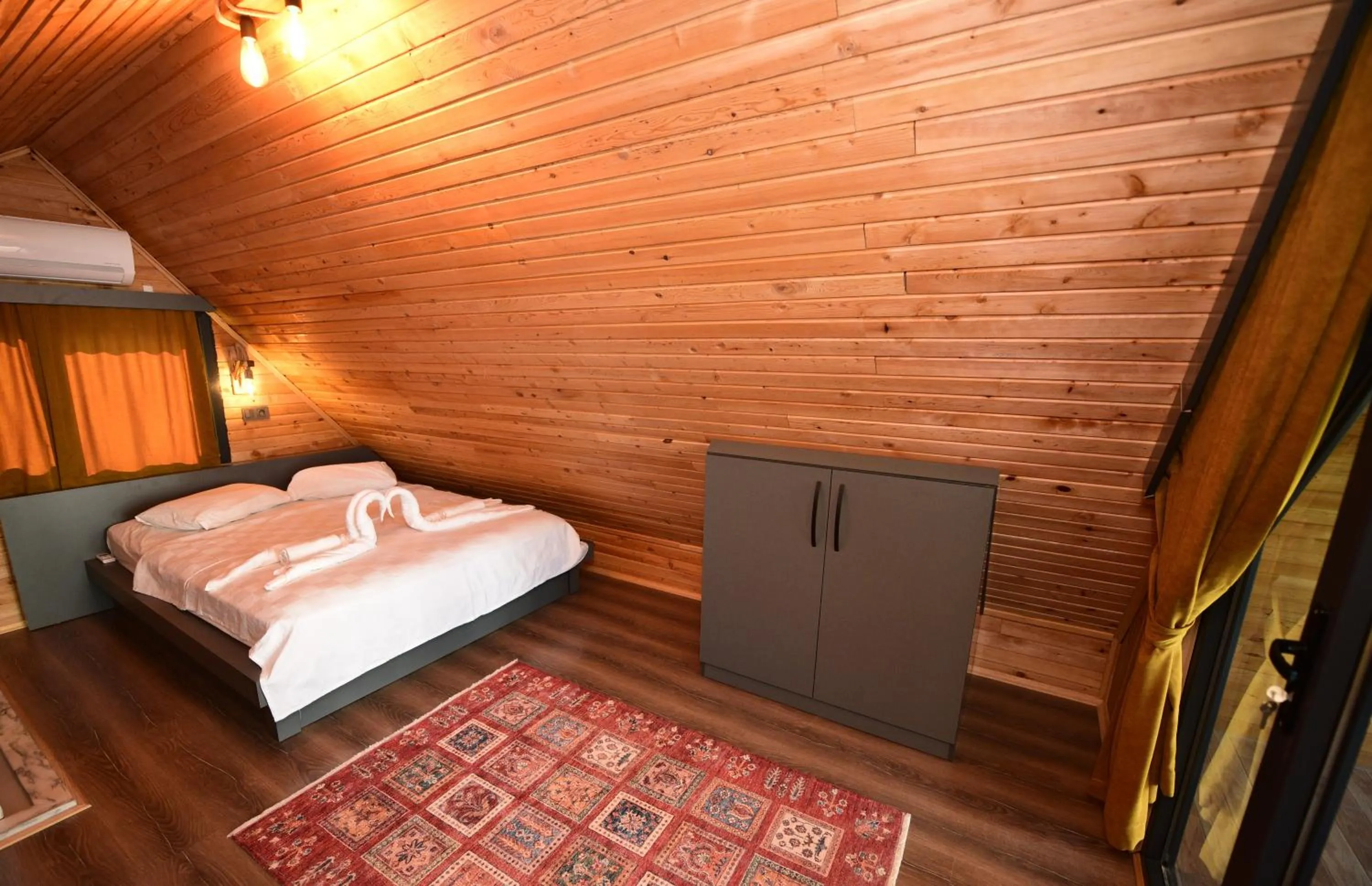 Bed in İRBEÇ APART & BUNGALOW