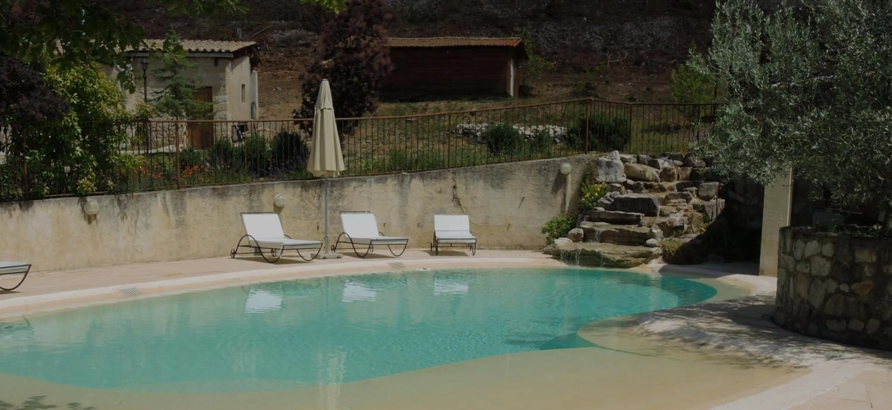 Pool view in B&B Le Deffends de Redon