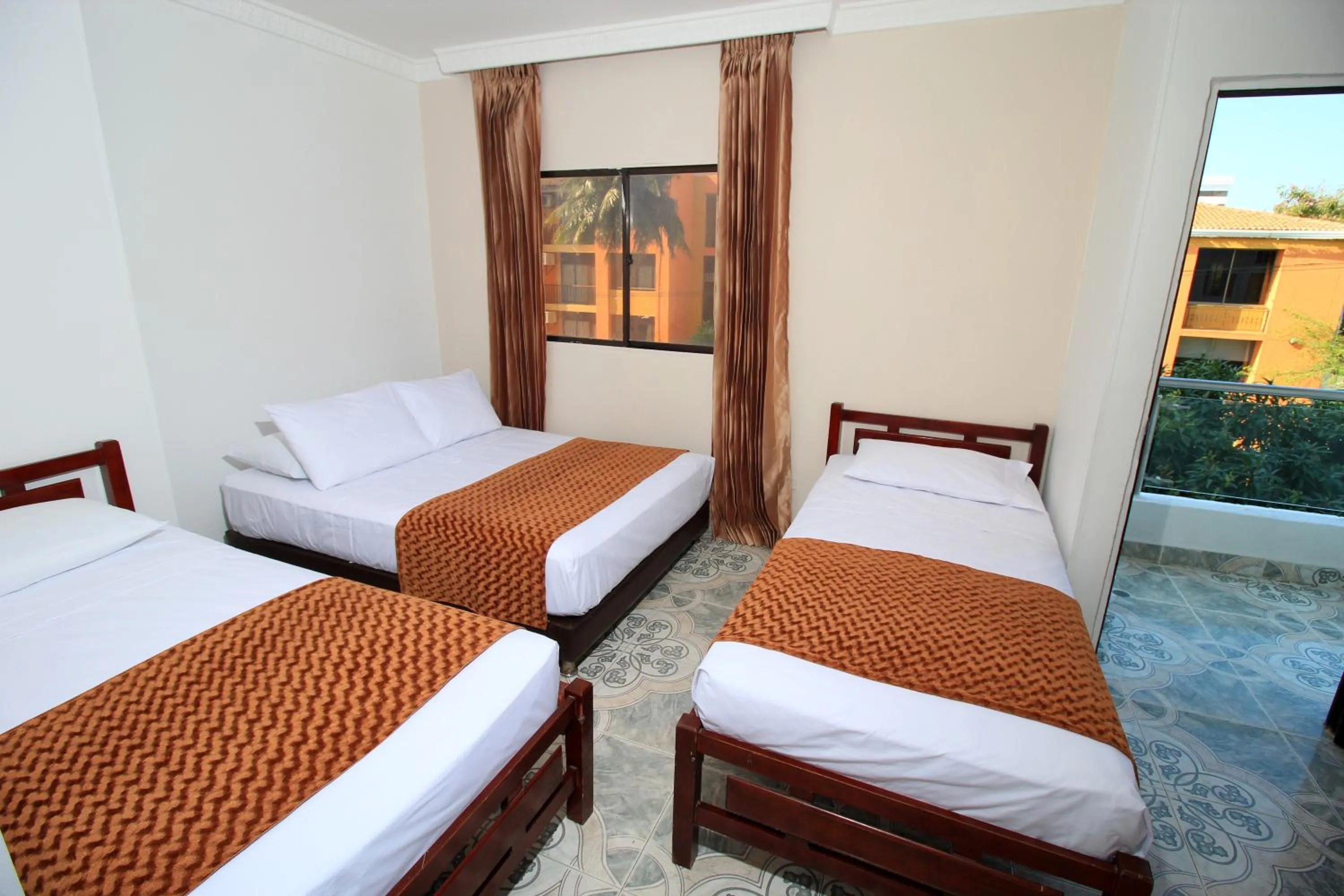 Bed in Hotel Rodadero Inn By GEH Suites