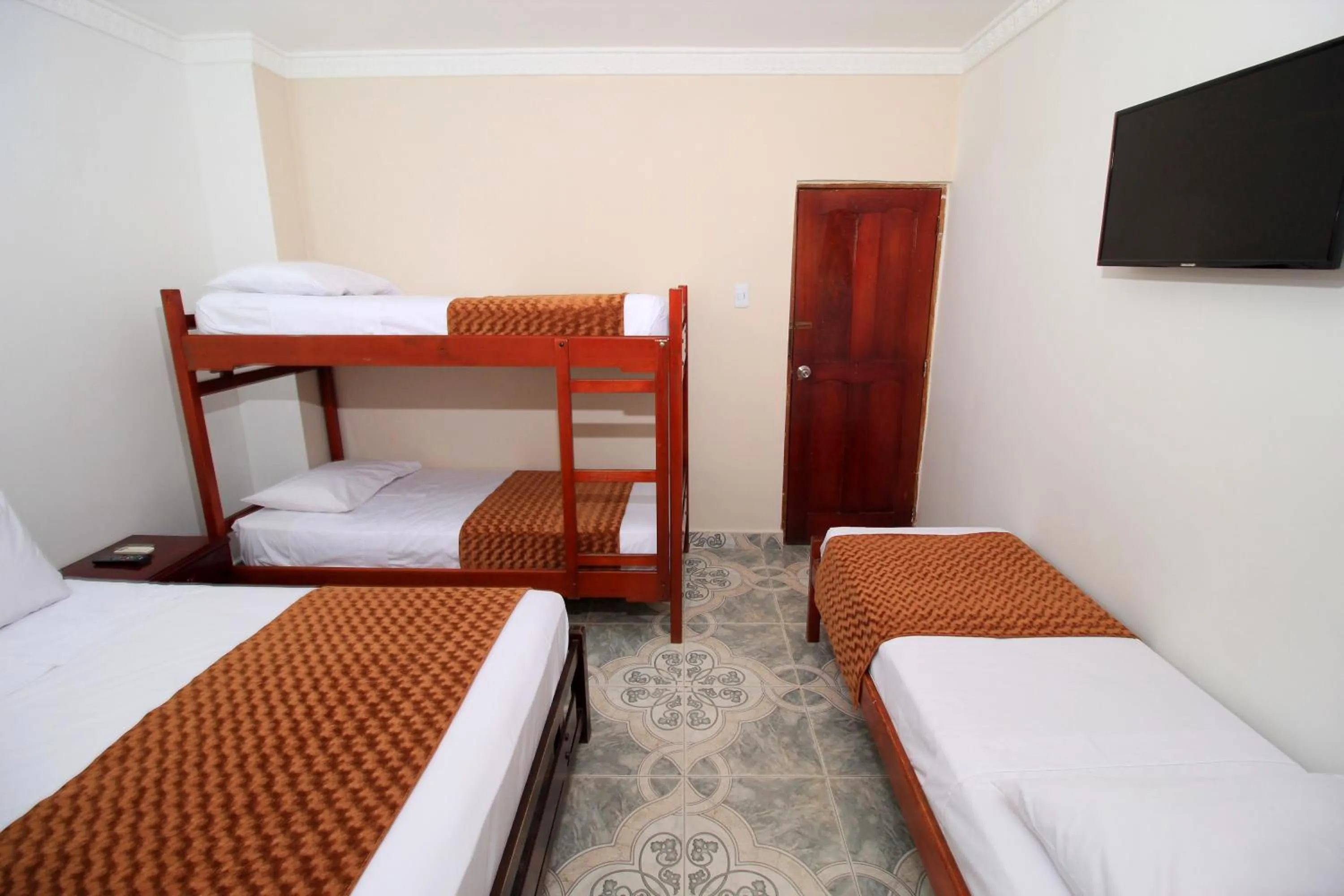 Bed in Hotel Rodadero Inn By GEH Suites