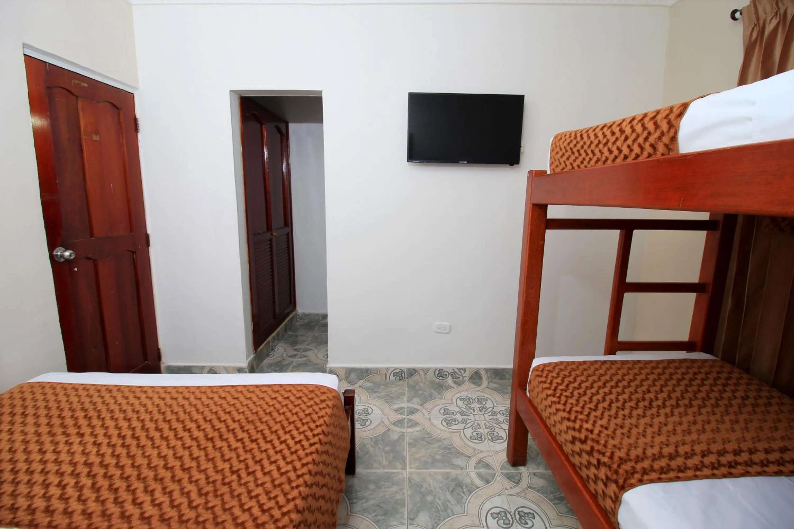 Bedroom, Bed in Hotel Rodadero Inn By GEH Suites