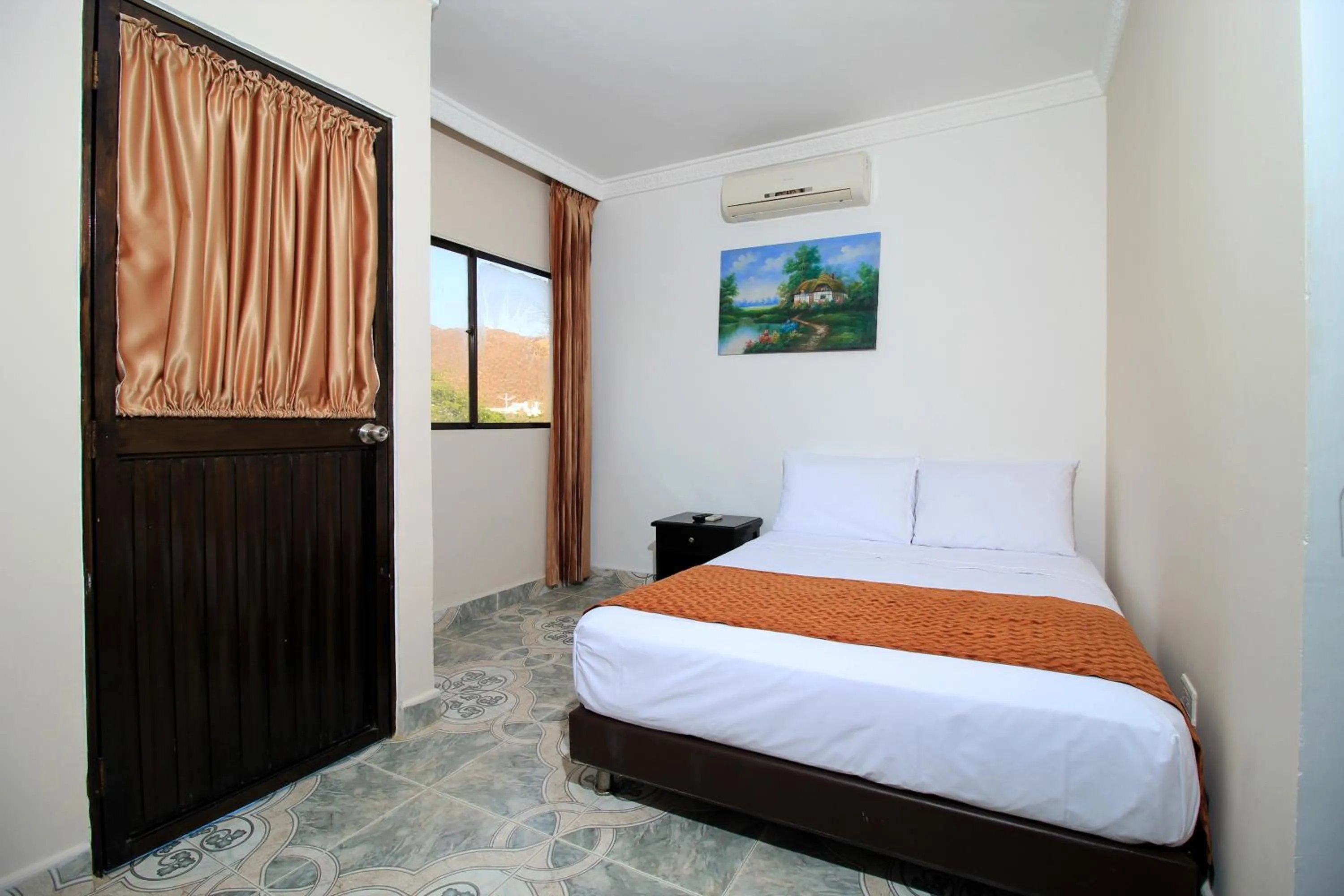 Bed in Hotel Rodadero Inn By GEH Suites
