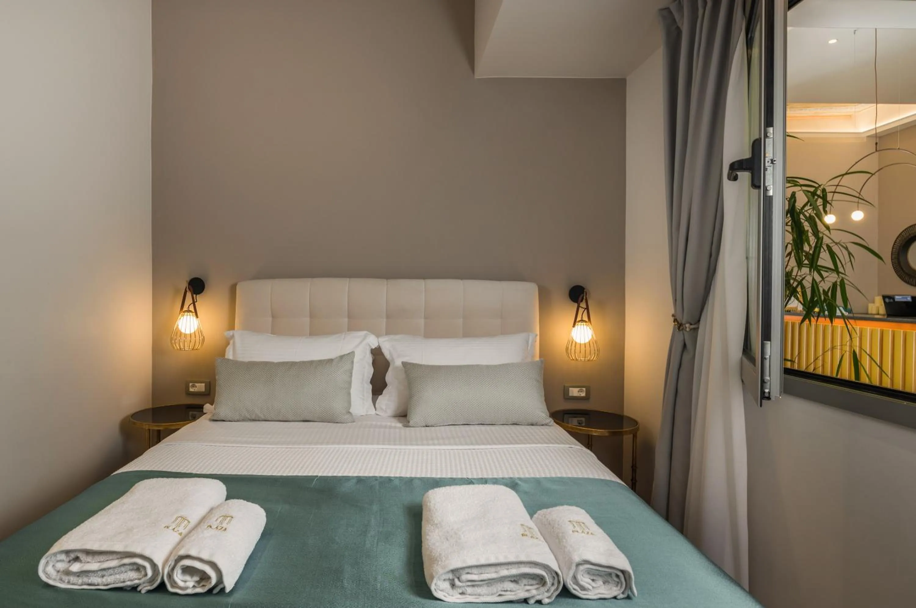 Bed in Plaza 1866 Superior City Rooms