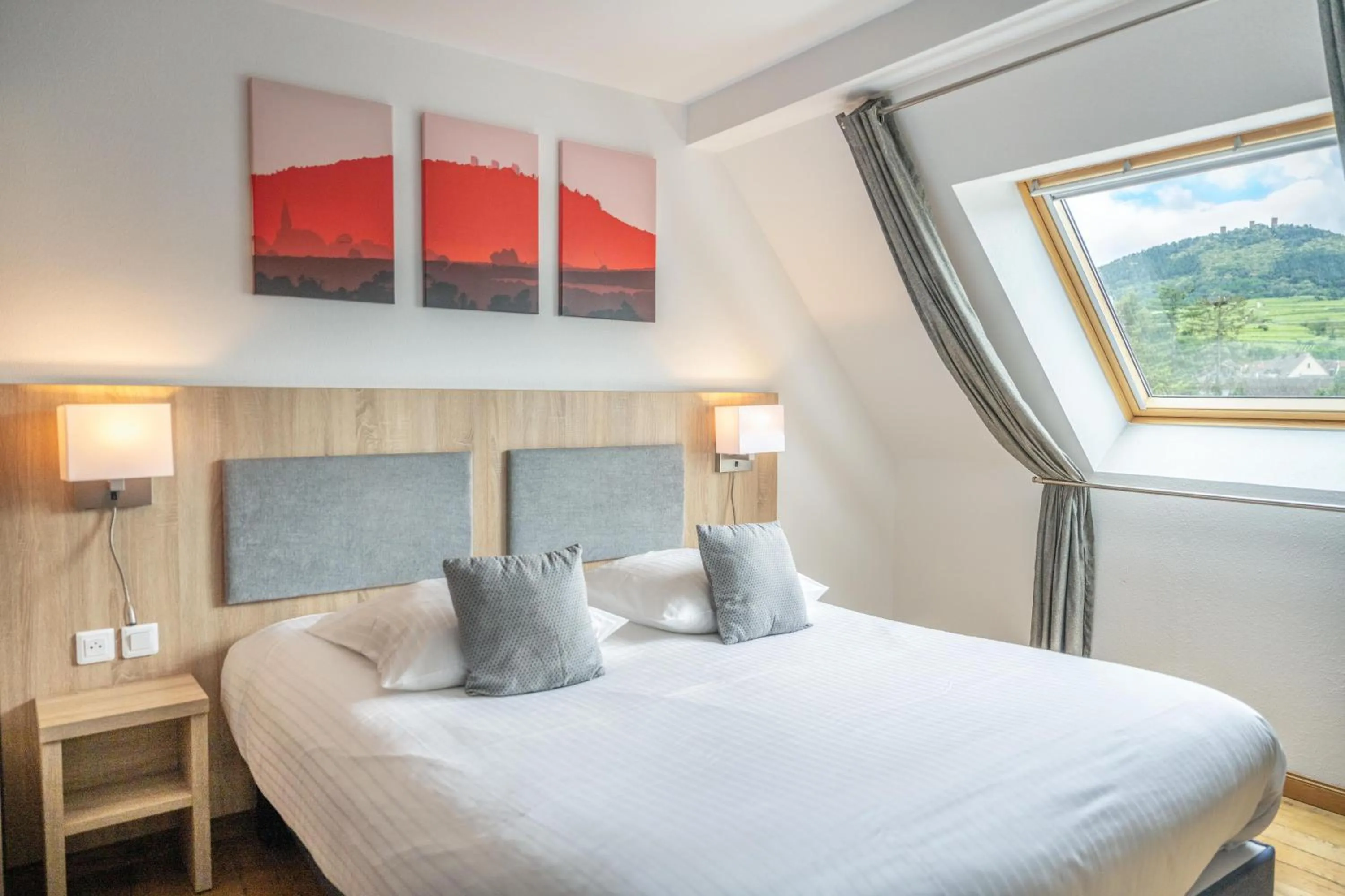 Photo of the whole room, Bed in Hotel Colmar Vignes Eguisheim