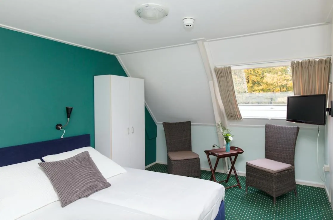 Bed in De Herberg van Anderen