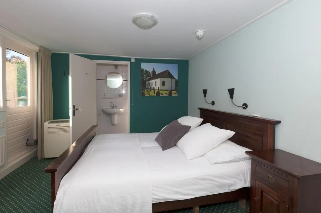 Bed in De Herberg van Anderen