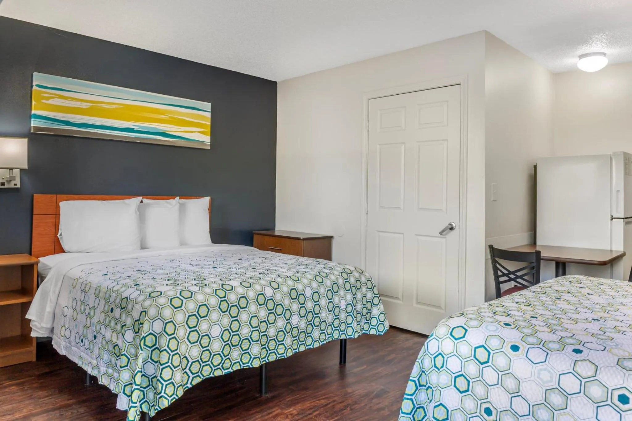 Photo of the whole room, Bed in HomeTowne Studios by Red Roof Louisville