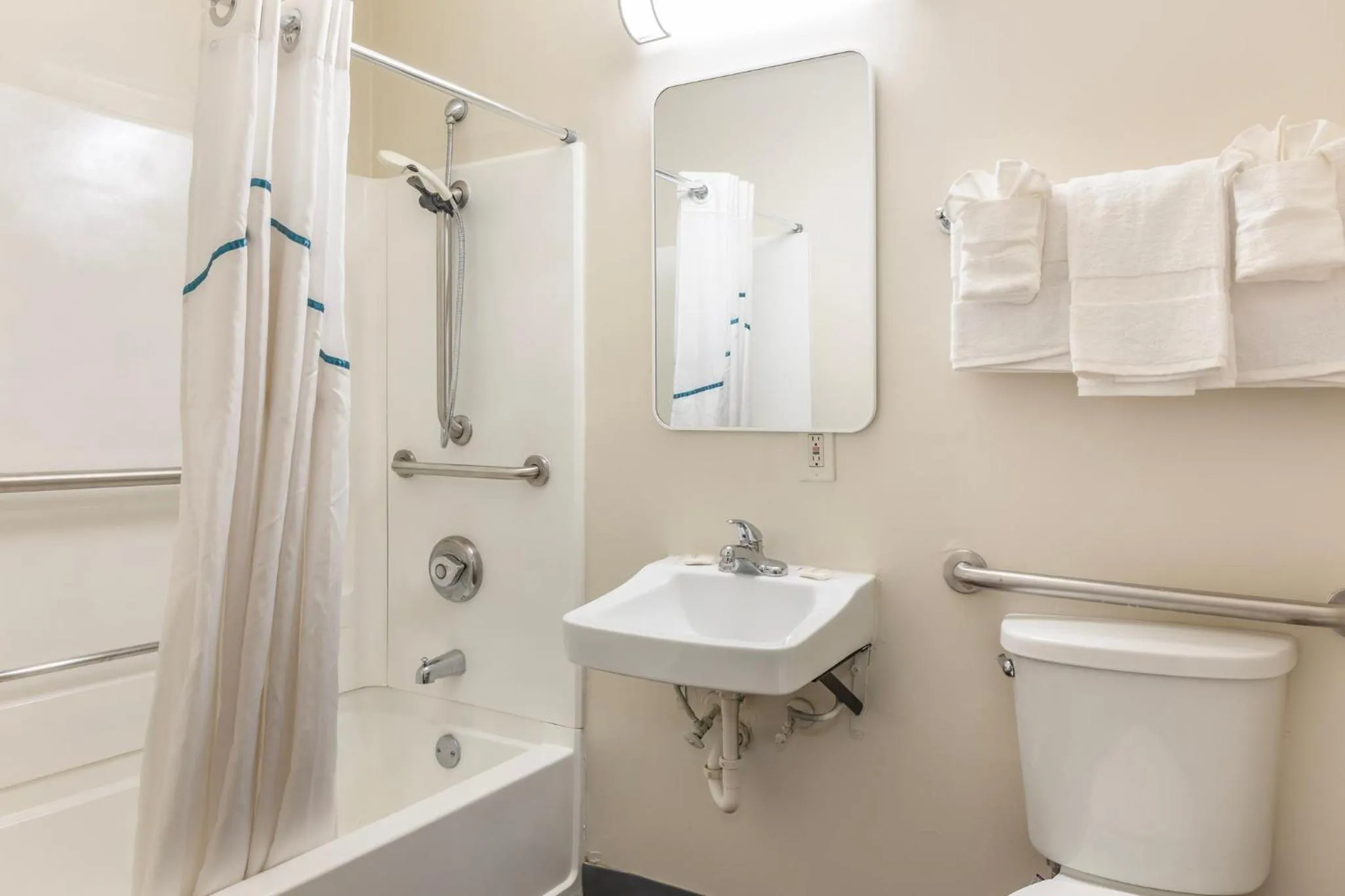 Bathroom in HomeTowne Studios by Red Roof Louisville