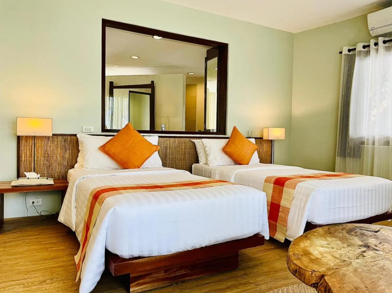 Bed in Amun Ini Beach Resort & Spa