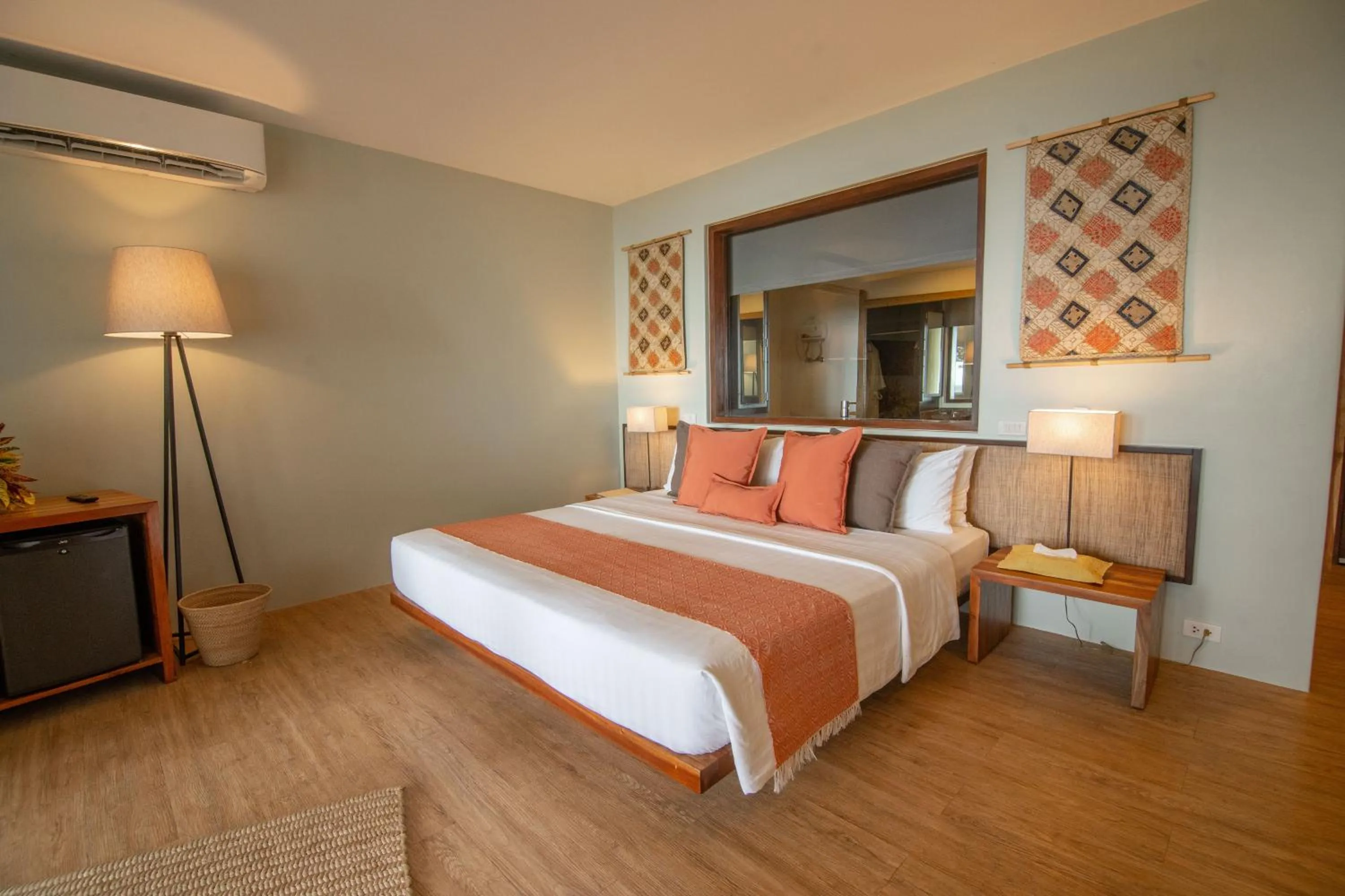 Bed in Amun Ini Beach Resort & Spa