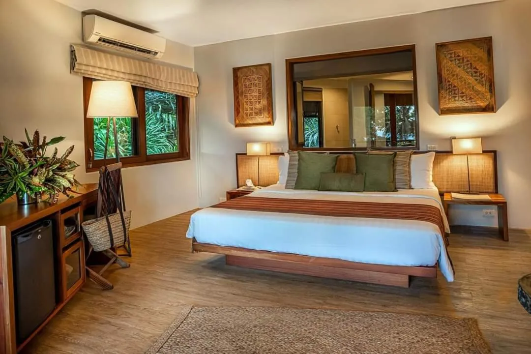 Bedroom, Bed in Amun Ini Beach Resort & Spa