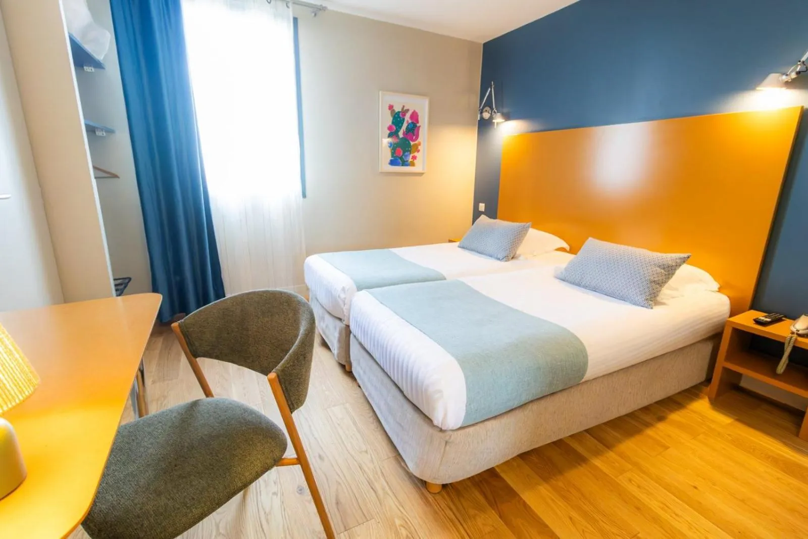 Photo of the whole room, Bed in Hôtel les jardins du canal - piscine chauffée - solaire eco responsable - parking - garage - bornes électriques - accueil vélos - kids friendly