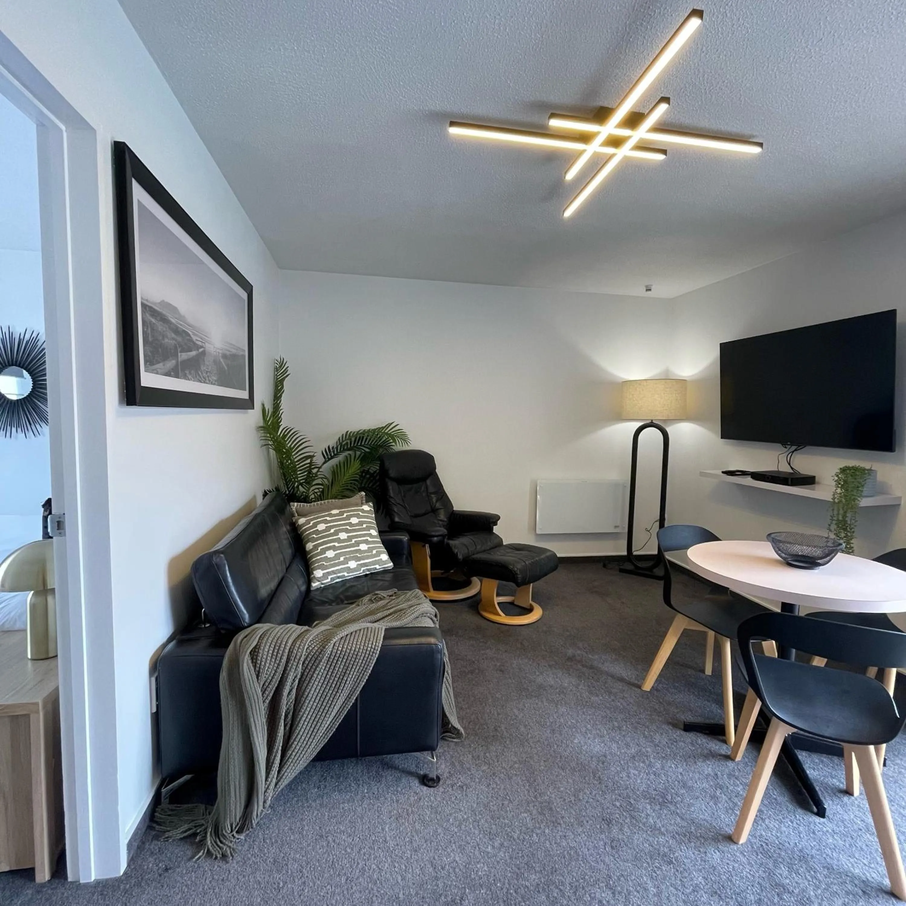 Living room in Apex Motorlodge