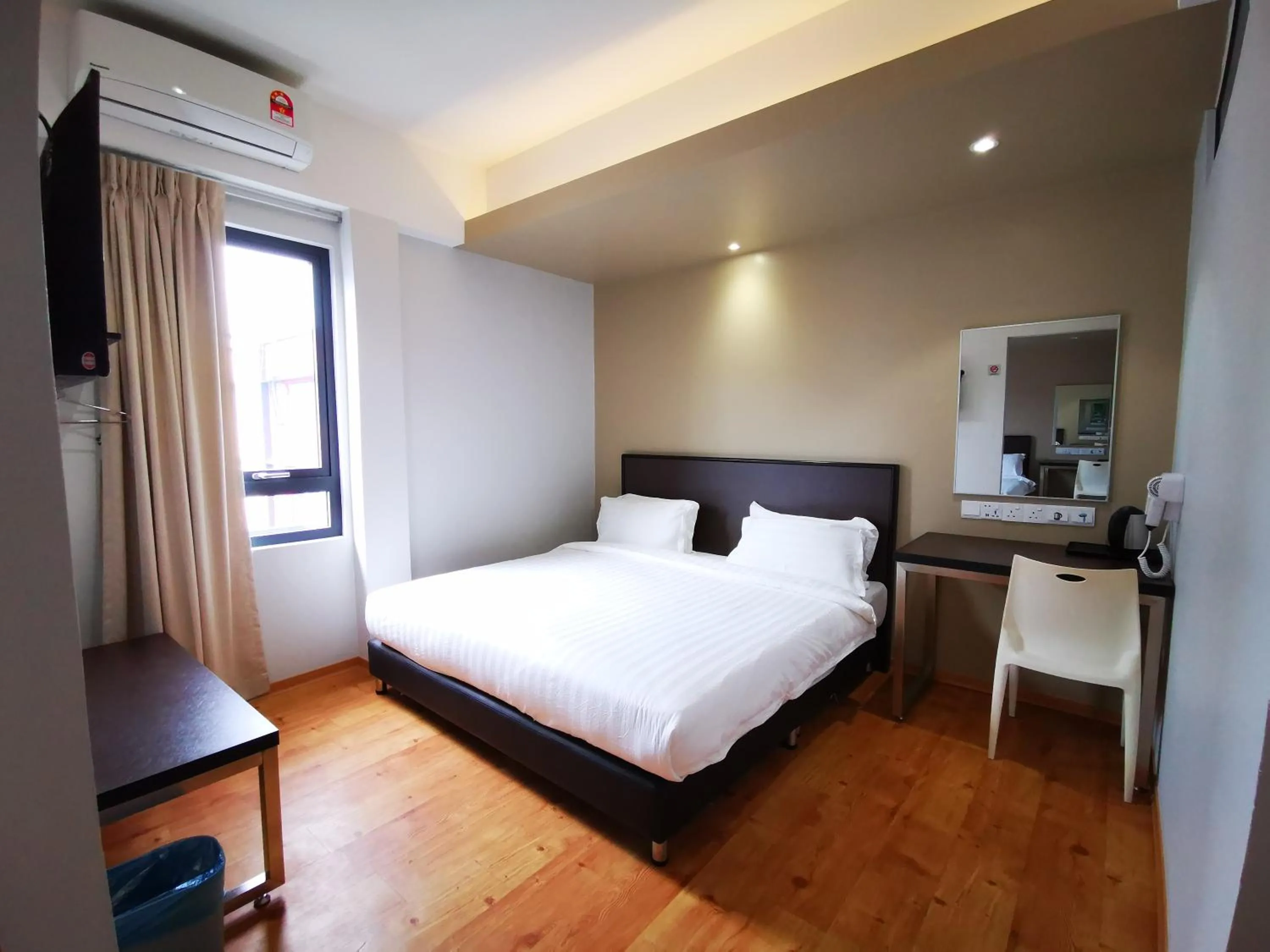 Photo of the whole room, Bed in D'Green Hotel Kuching