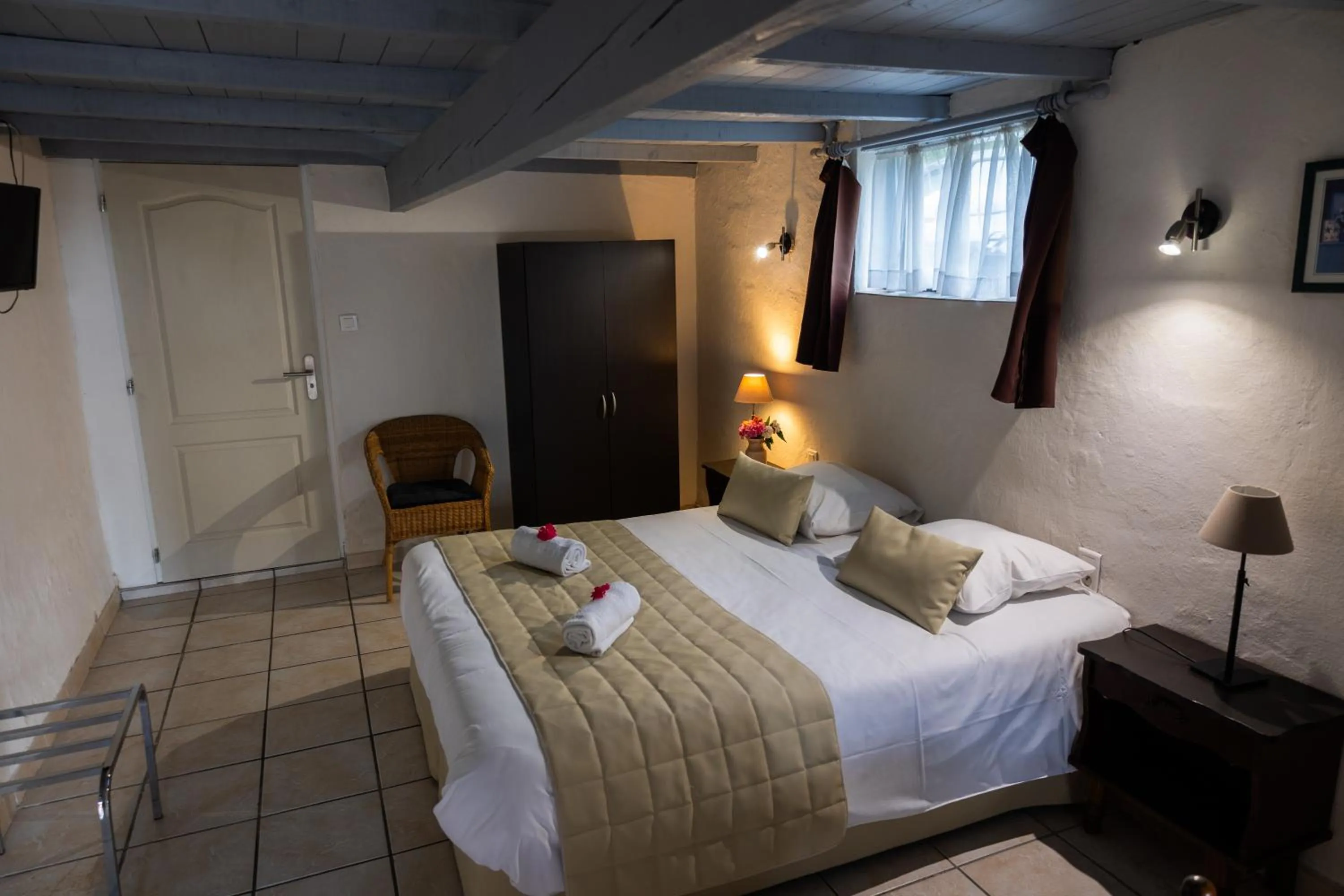 Bed in Logis des Crêtes de Pignols