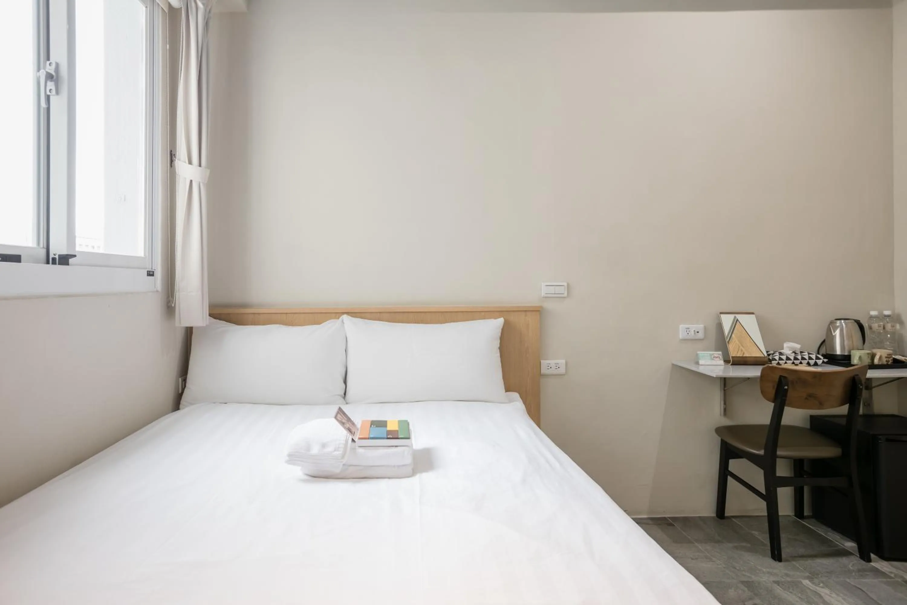 Bed in Tiin Tinn Inn - Tiehua Xiutai