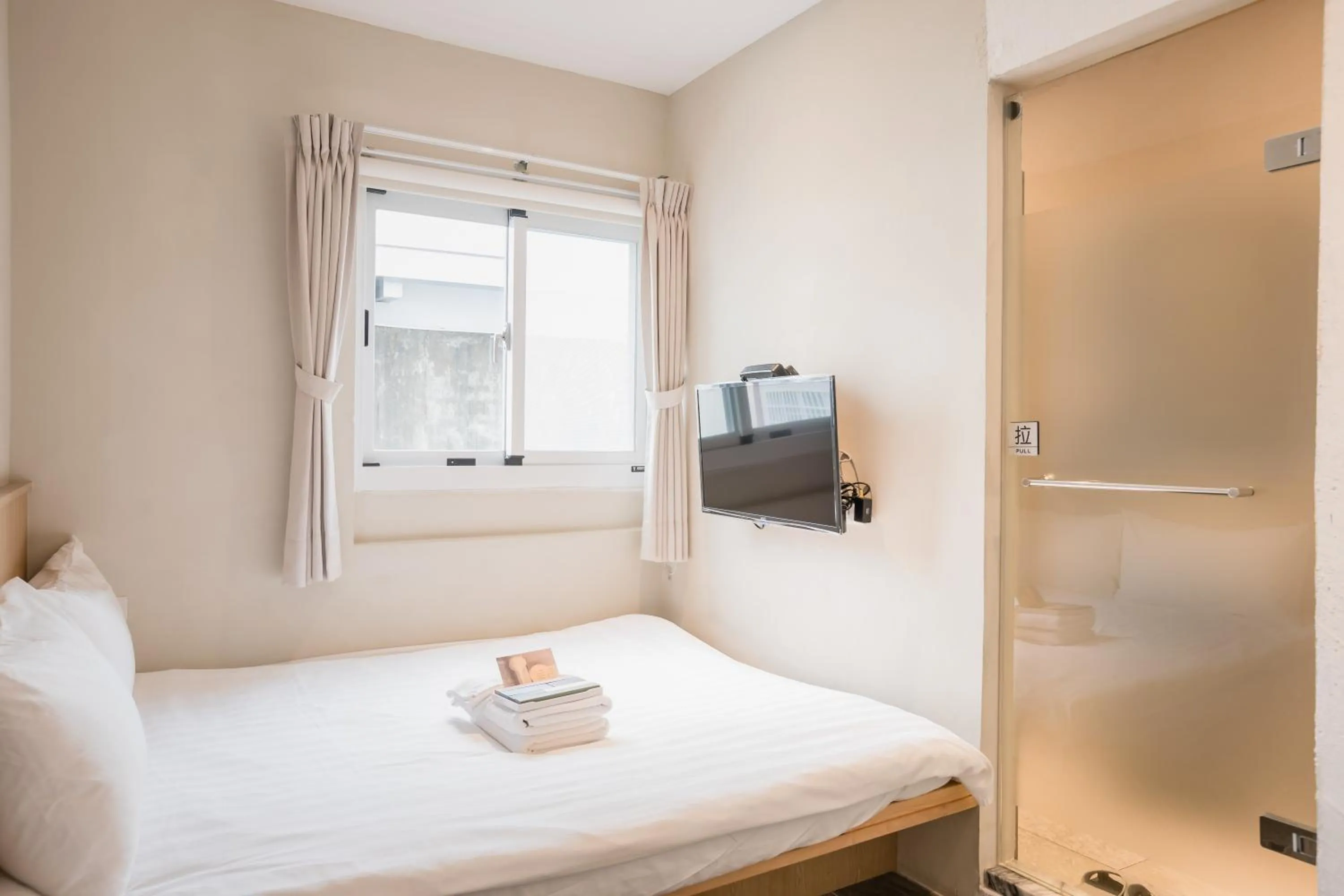 Bed in Tiin Tinn Inn - Tiehua Xiutai