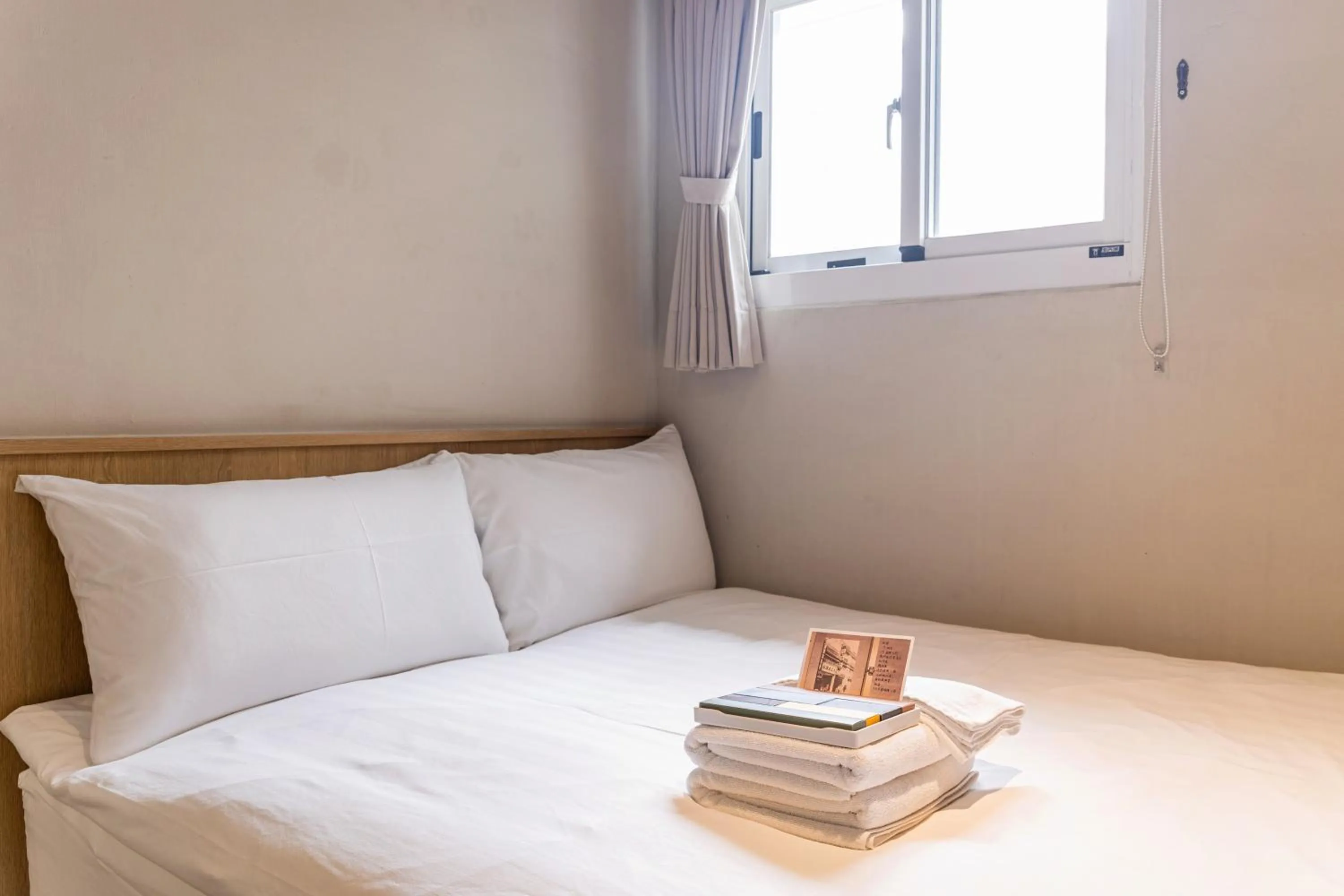 Bed in Tiin Tinn Inn - Tiehua Xiutai