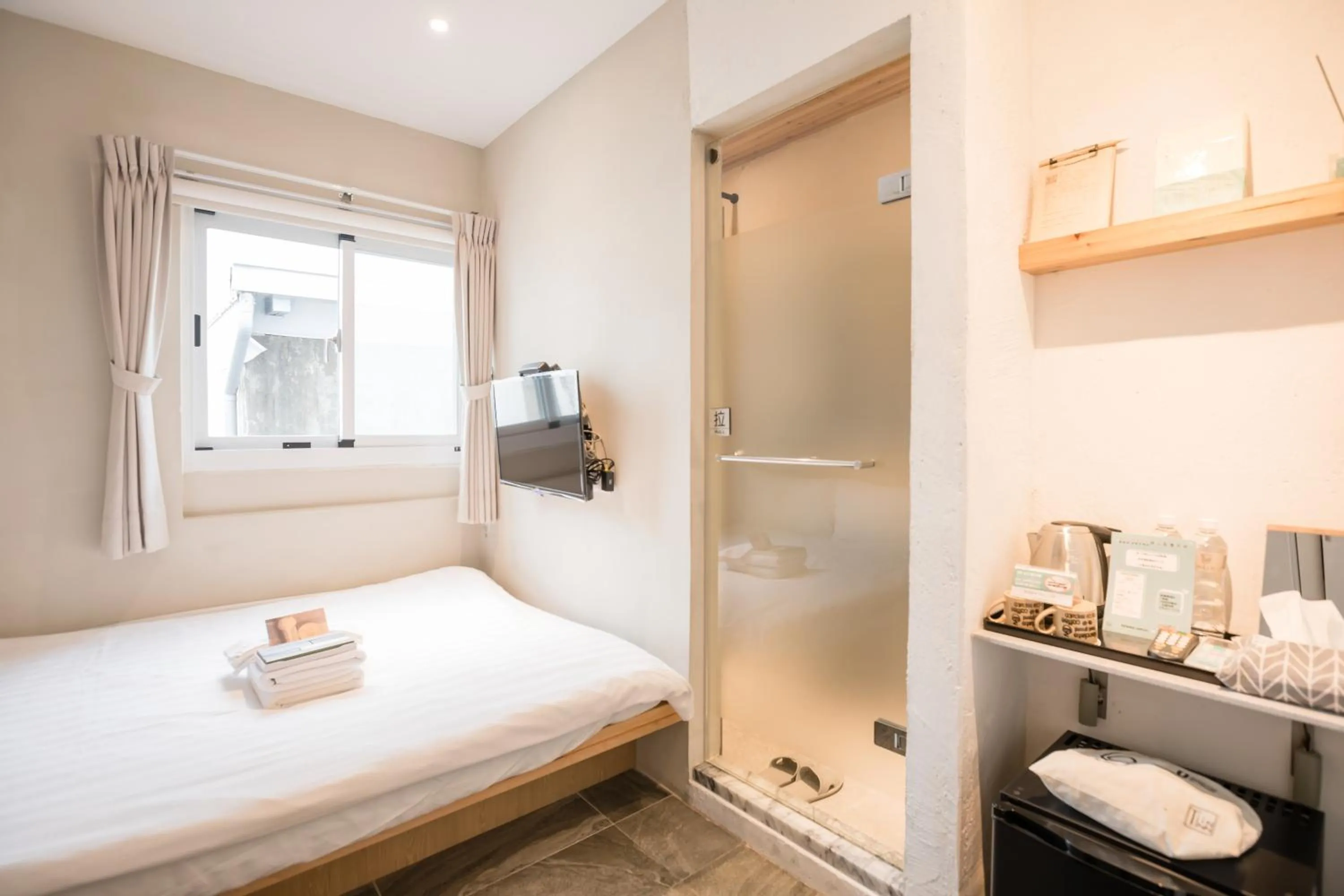 Bed in Tiin Tinn Inn - Tiehua Xiutai