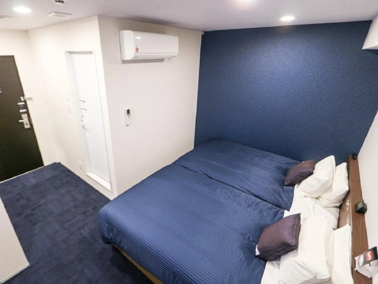Bed in HOTEL LiVEMAX Nigata Nagaoka Station