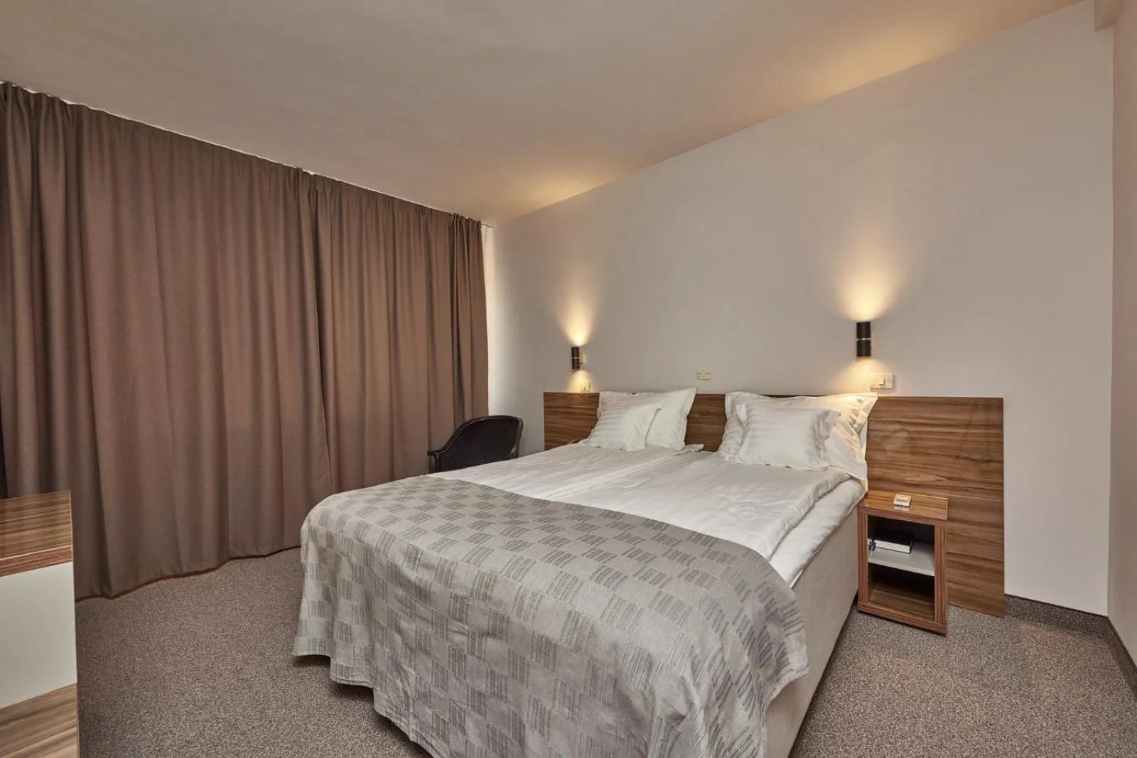 Bed in Riviera by Queens Hotel and Resort