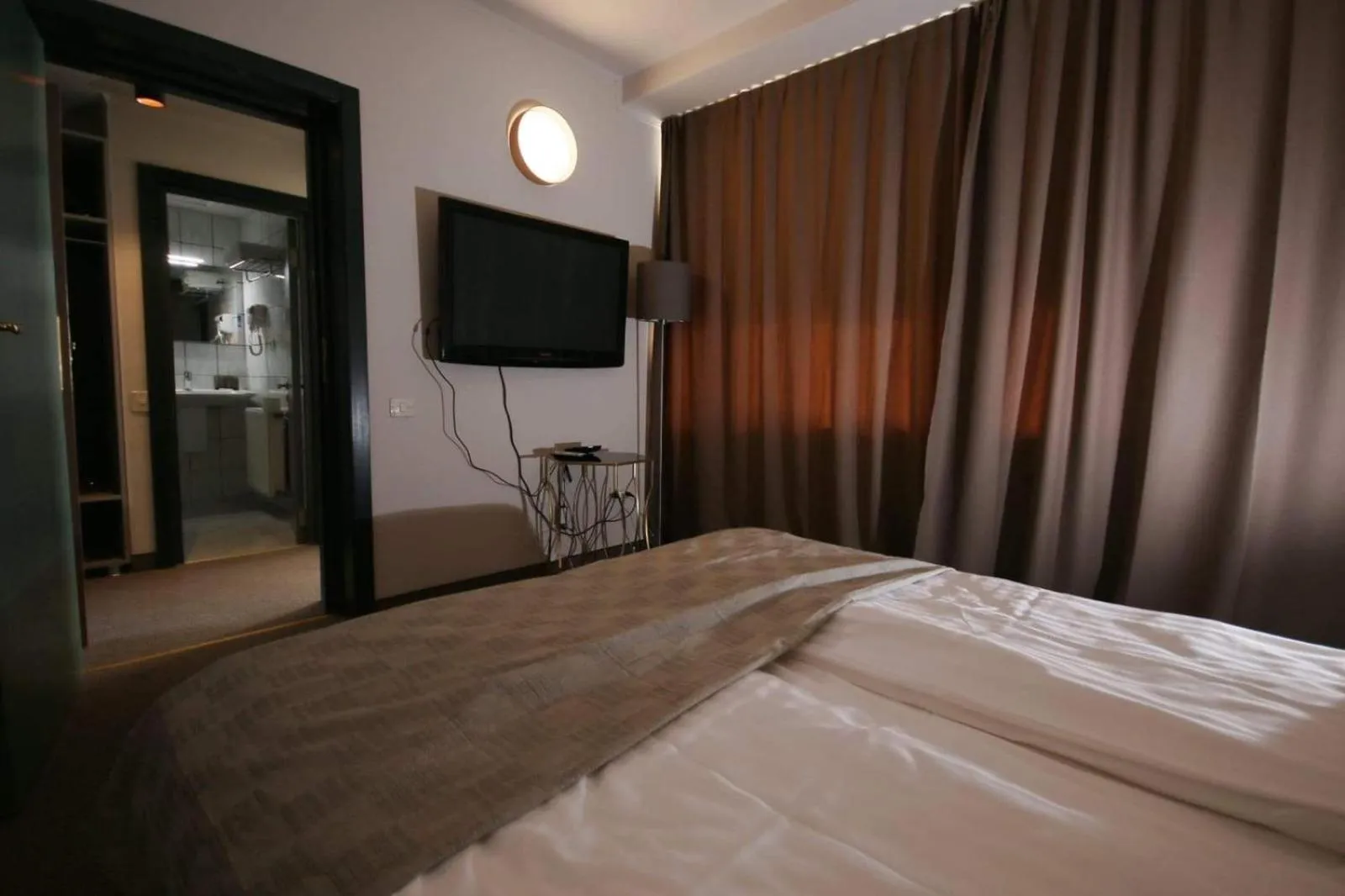 Bed in Riviera by Queens Hotel and Resort