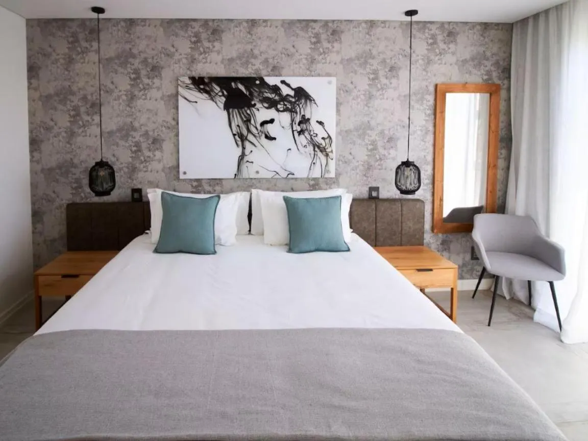 Bed in Central Beach Villas