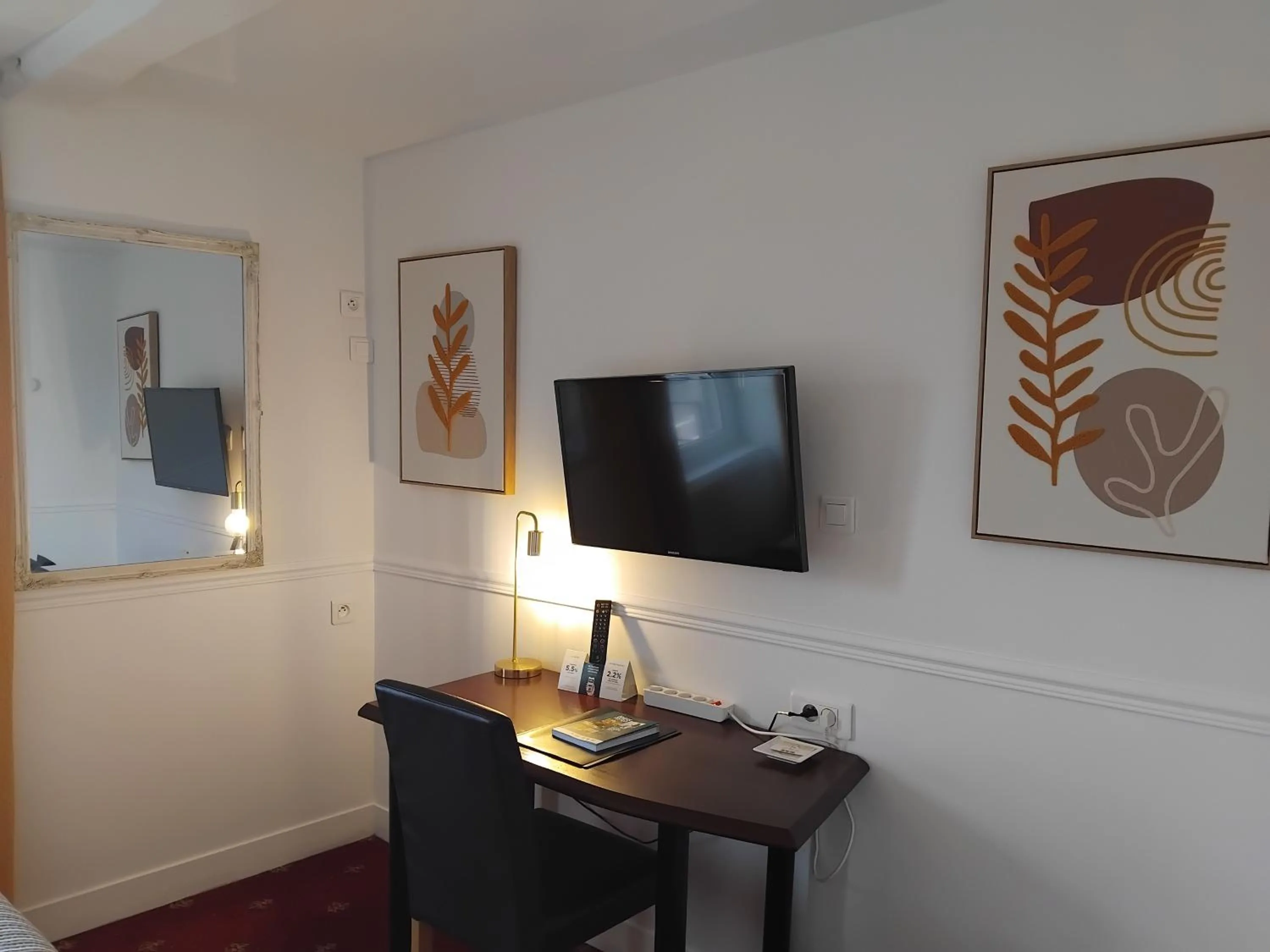 Bedroom in Logis HOTEL RESTAURANT La Régence