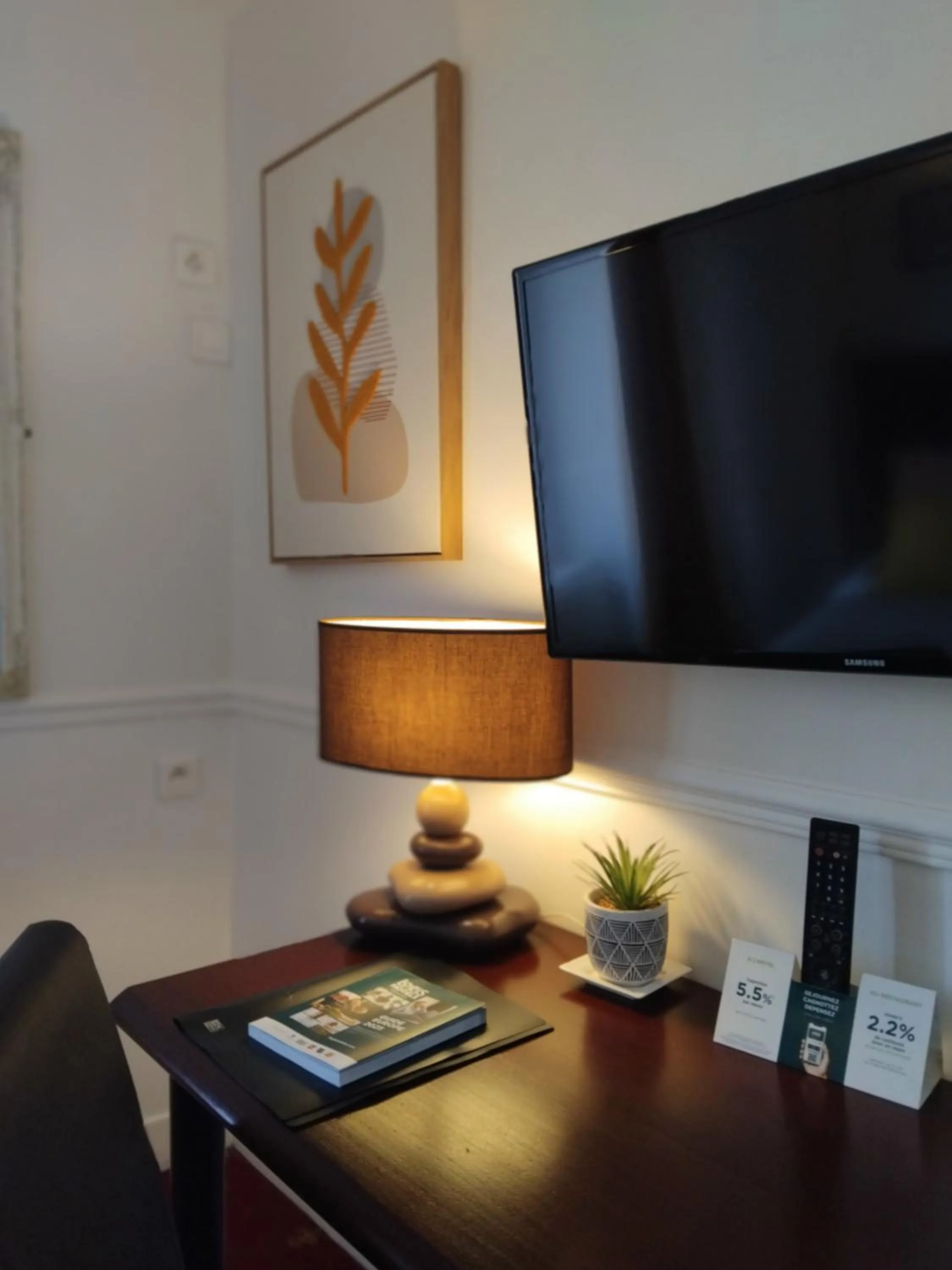 Seating area in Logis HOTEL RESTAURANT La Régence
