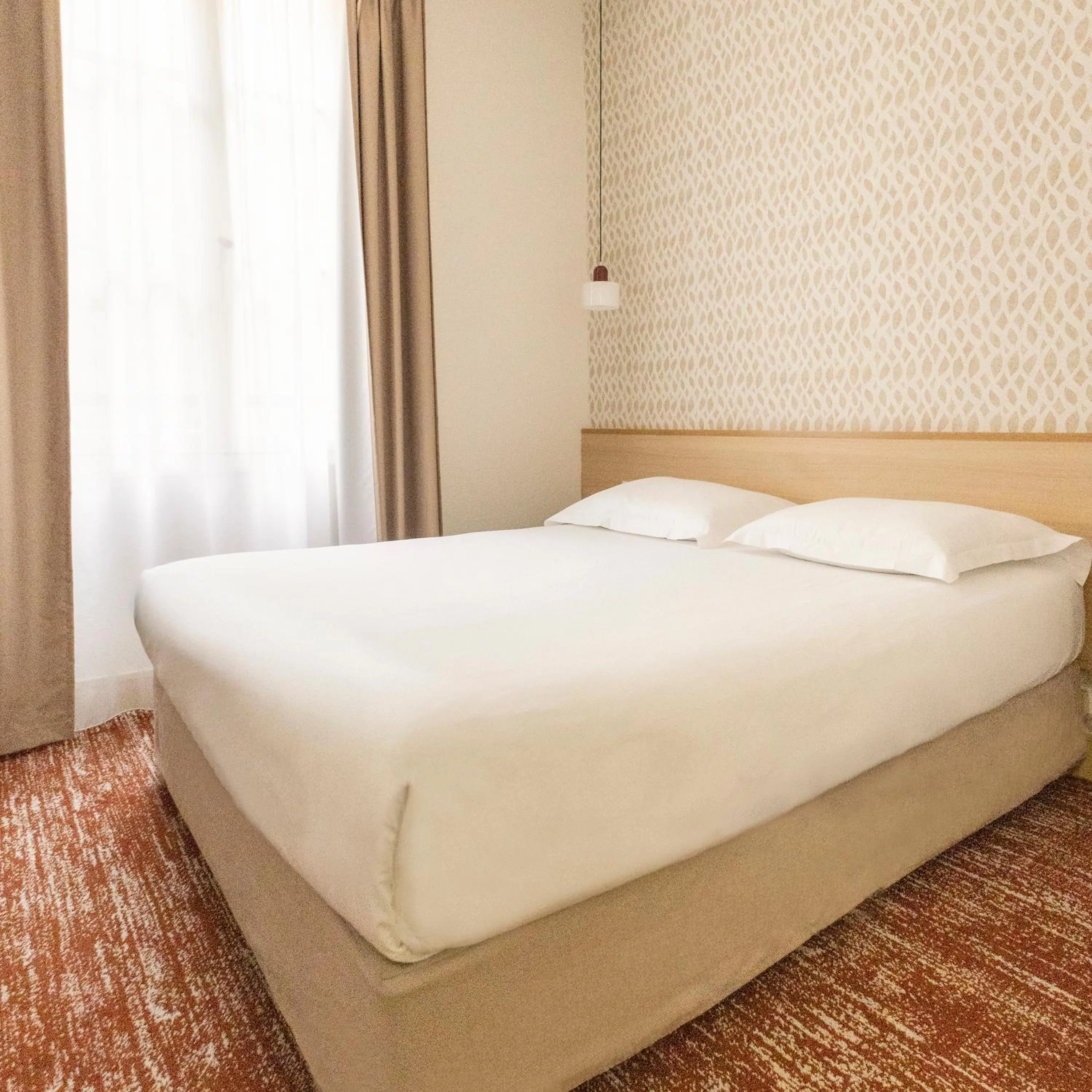 Bed in Hotel Gambetta