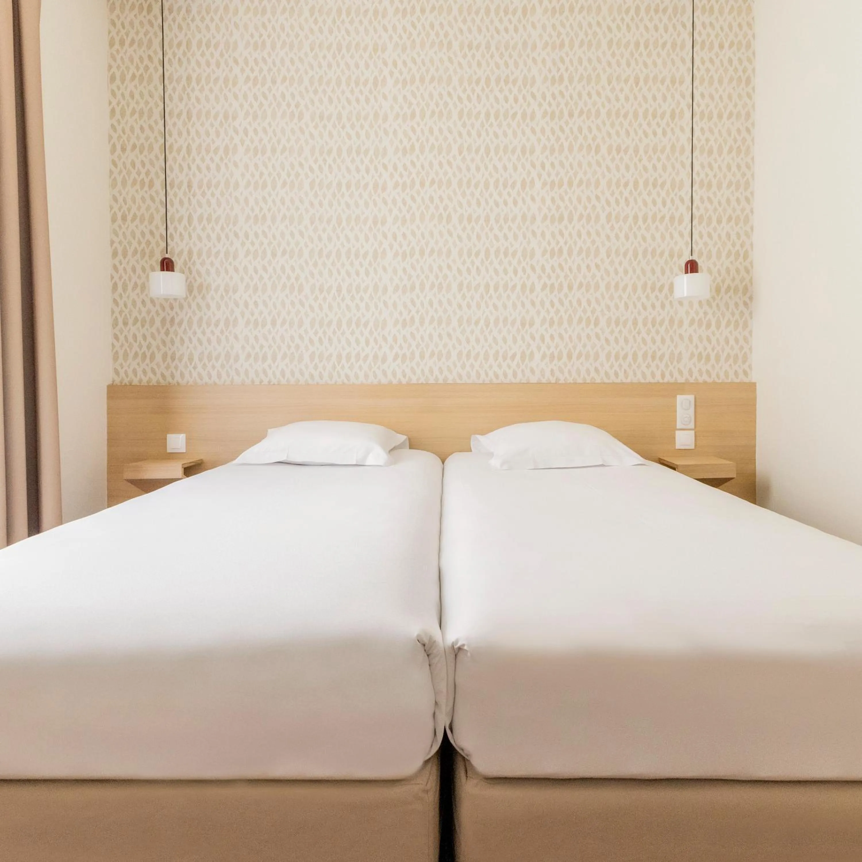 Bed in Hotel Gambetta