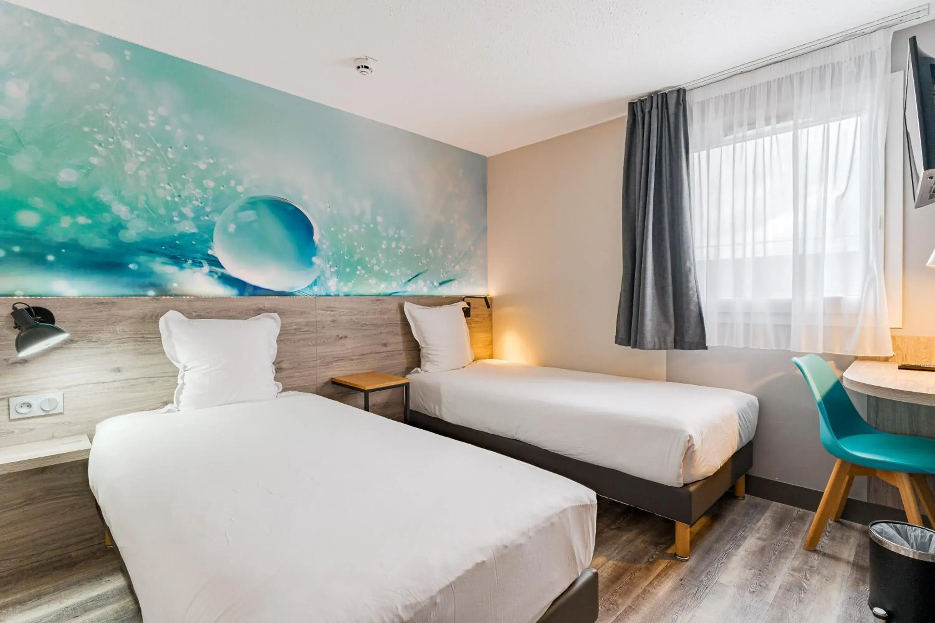 Standard Twin Room in Kyriad Direct Tours Sud - Chambray Lès Tours Standard Twin Room in Kyriad Direct Tours Sud - Chambray Lès Tours