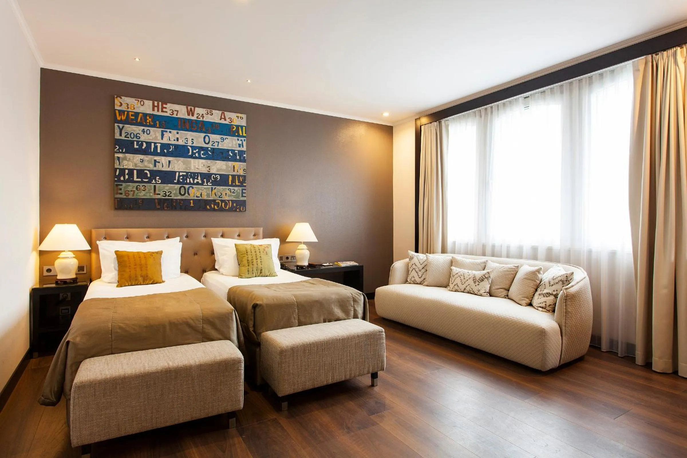 Bed in Quentin Boutique Hotel