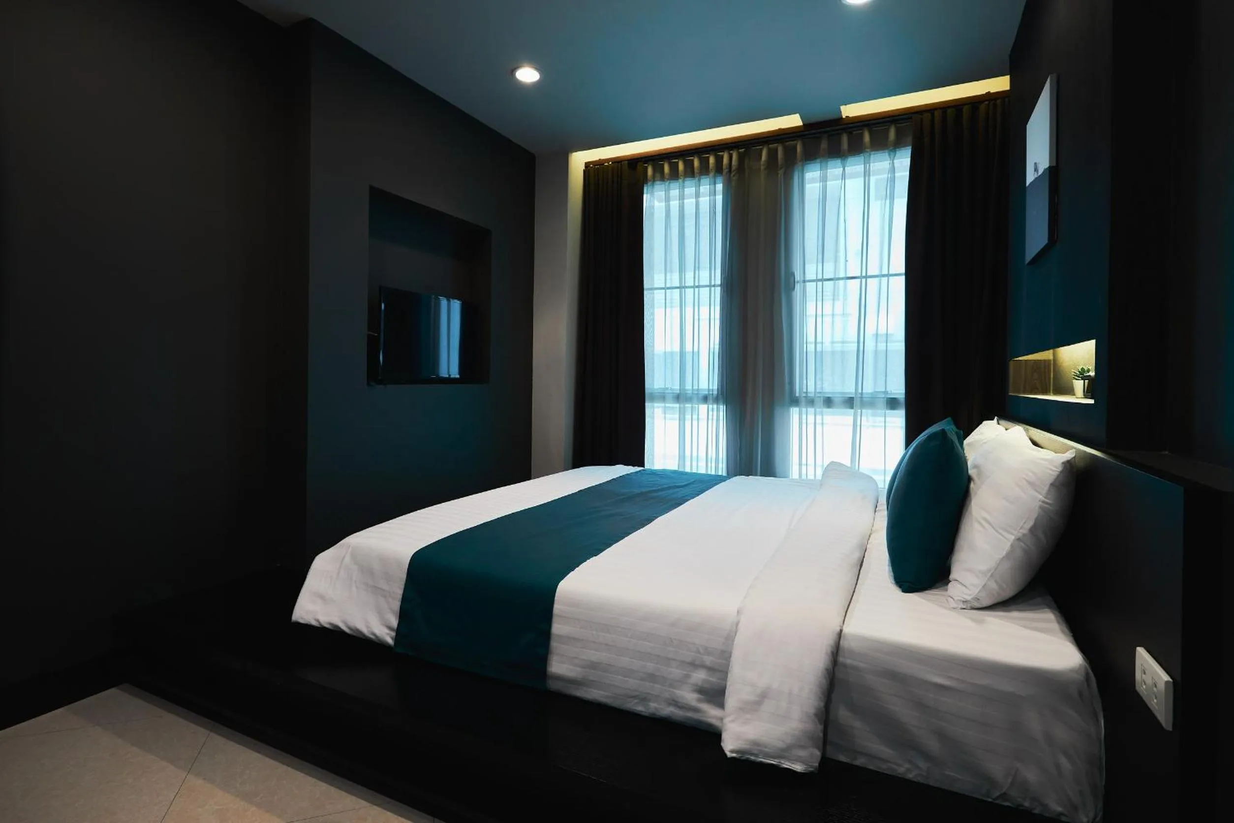 Bed in 42Grand Residence