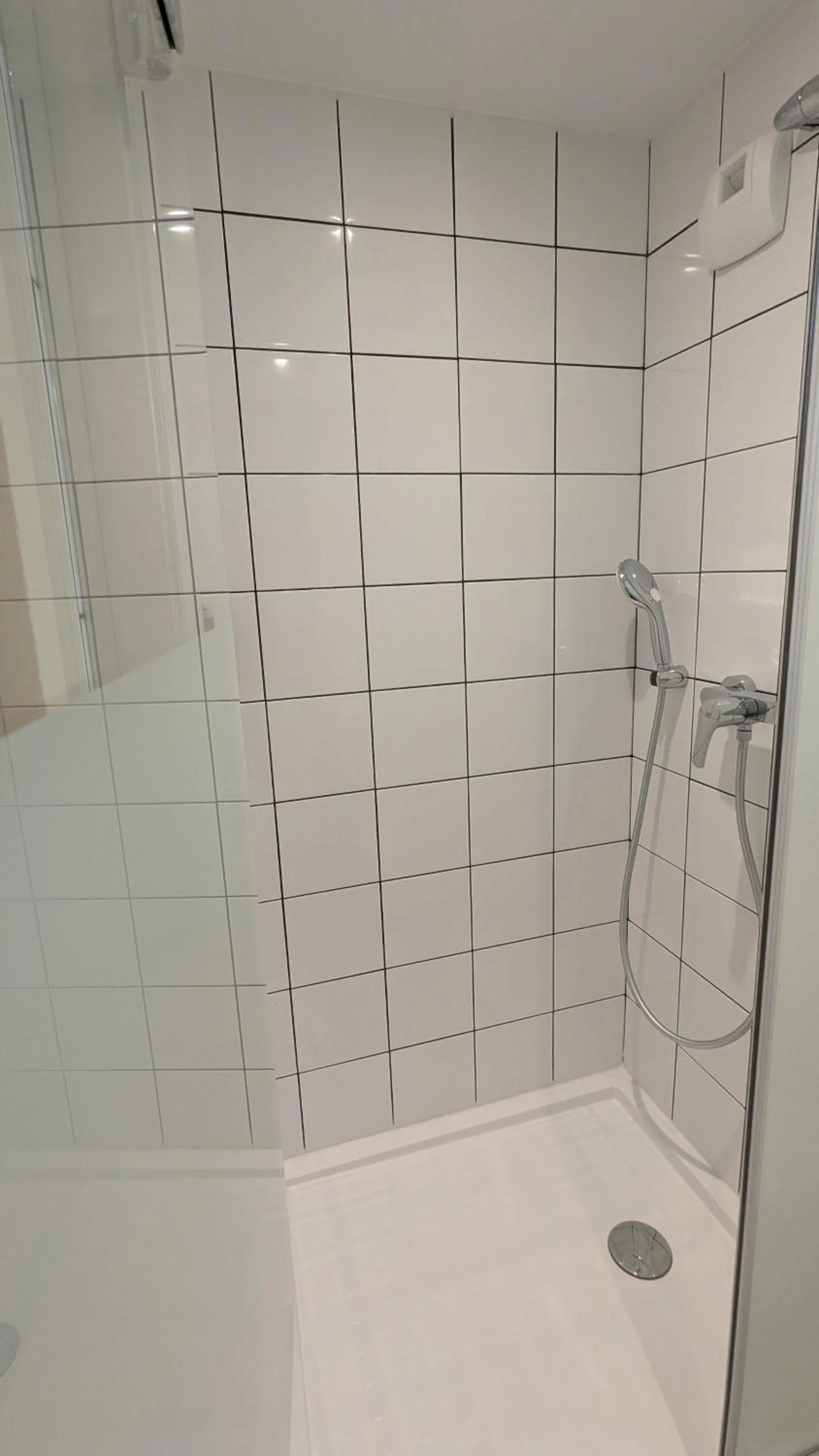 Shower in Ibis Budget La Rochelle Puilboreau