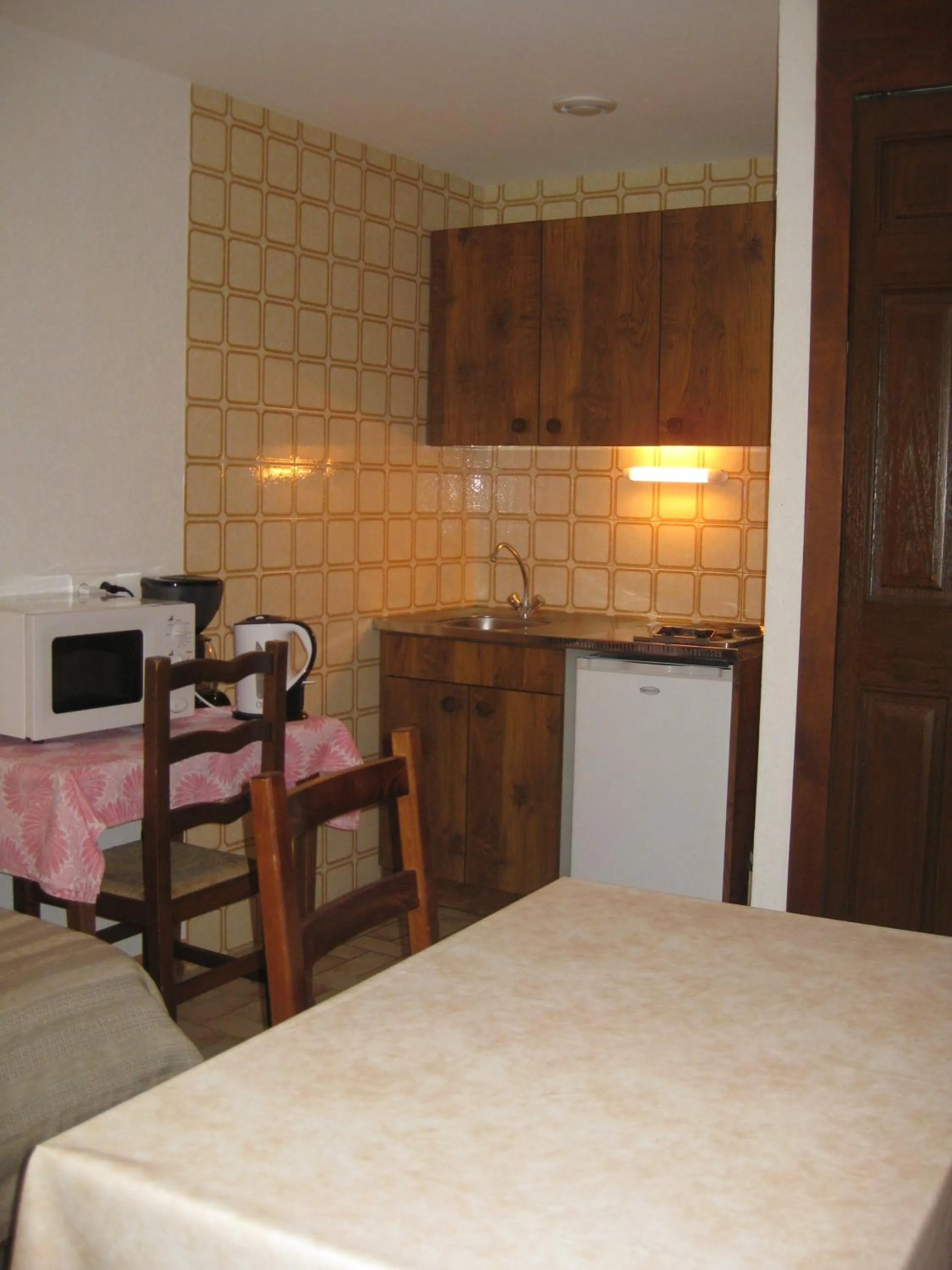 Dining area in Hôtel Les Pavillons du Golf